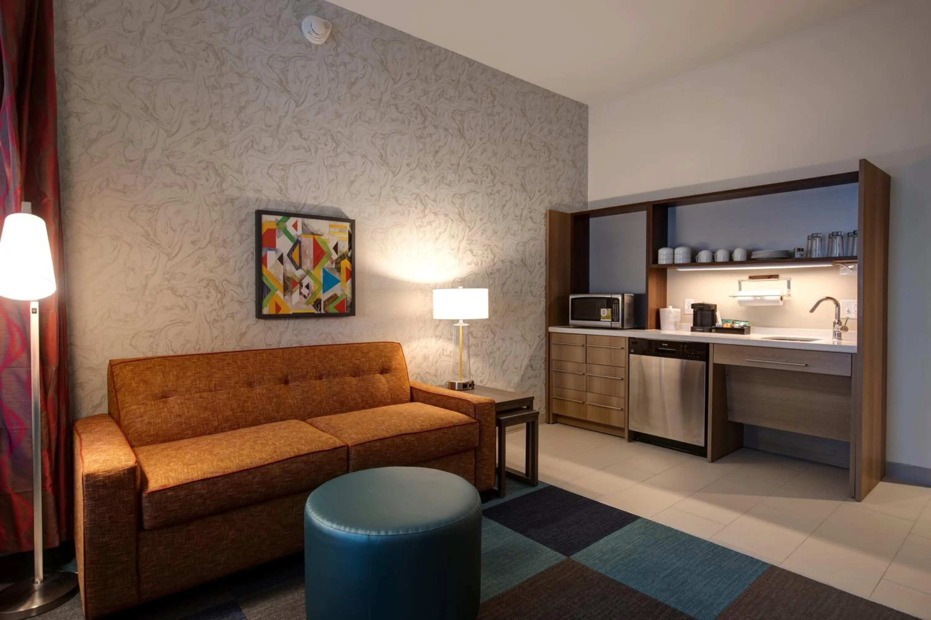 Seating area in Home2 Suites By Hilton Charlotte Uptown