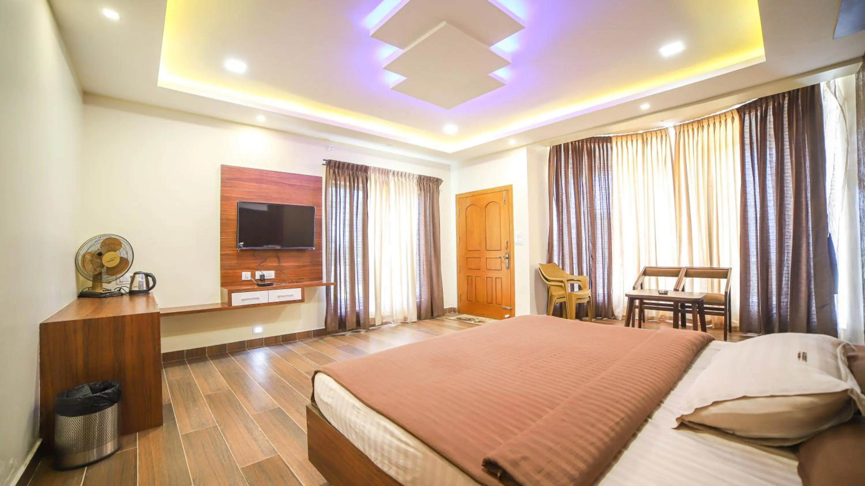 Bed in Aira Residency Kothagiri by Lexstays