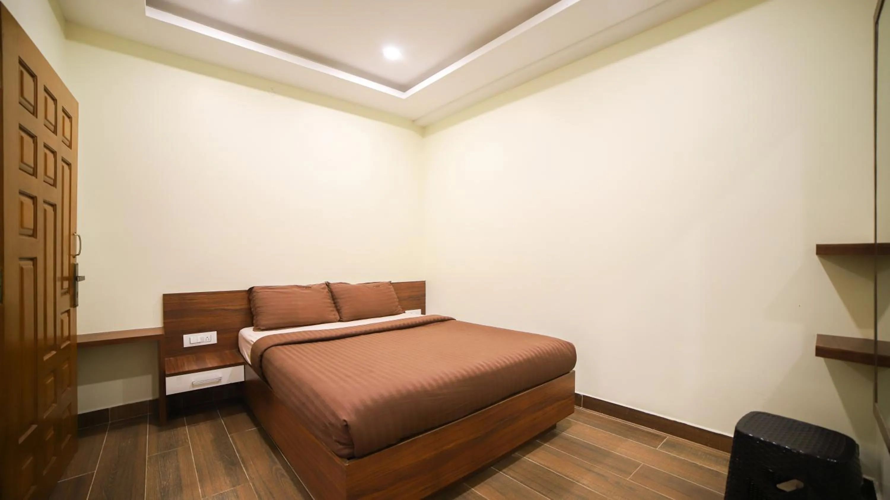 Bedroom, Bed in Aira Residency Kothagiri by Lexstays