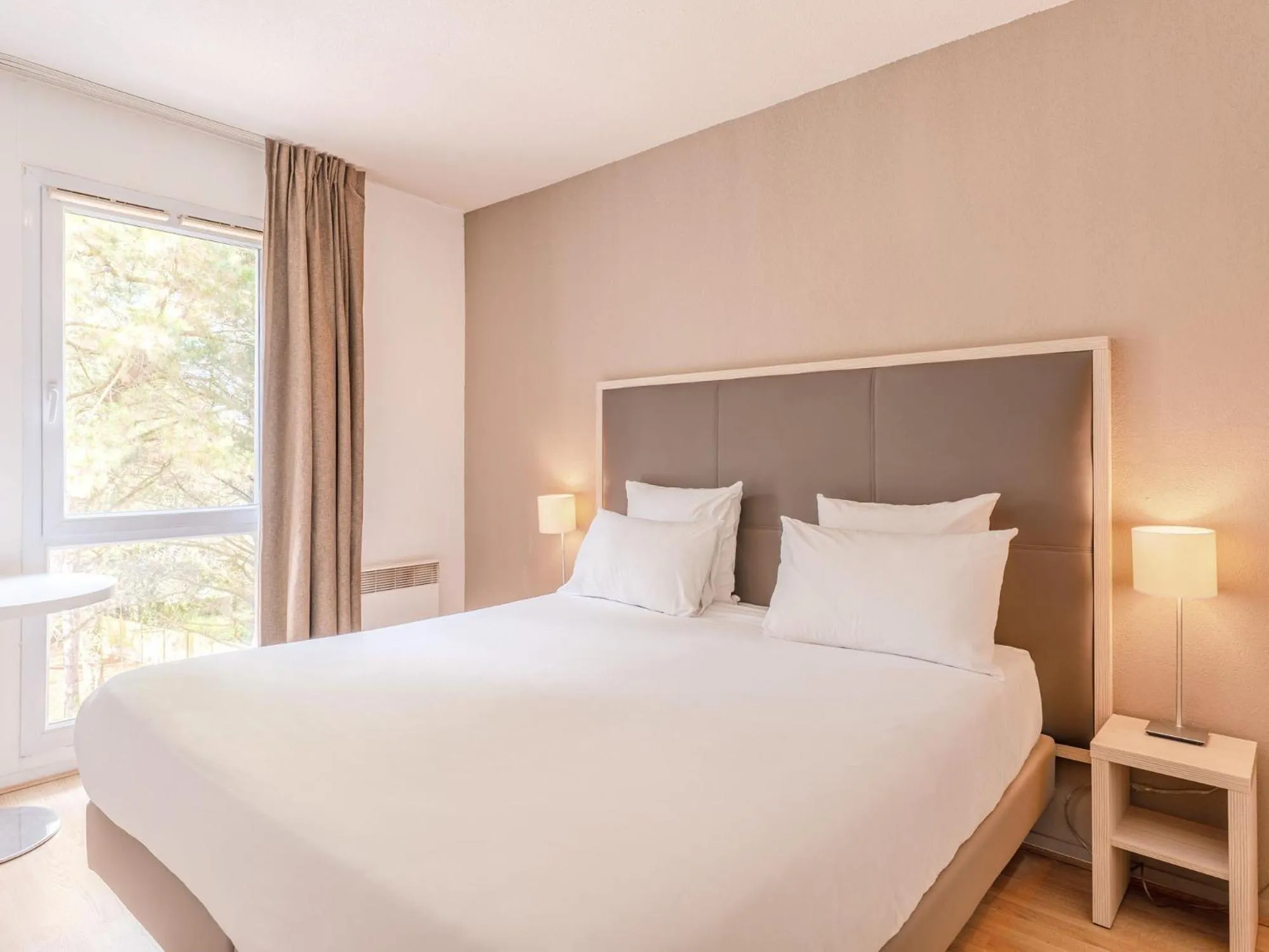 Bedroom, Bed in Séjours & Affaires Nantes La Beaujoire