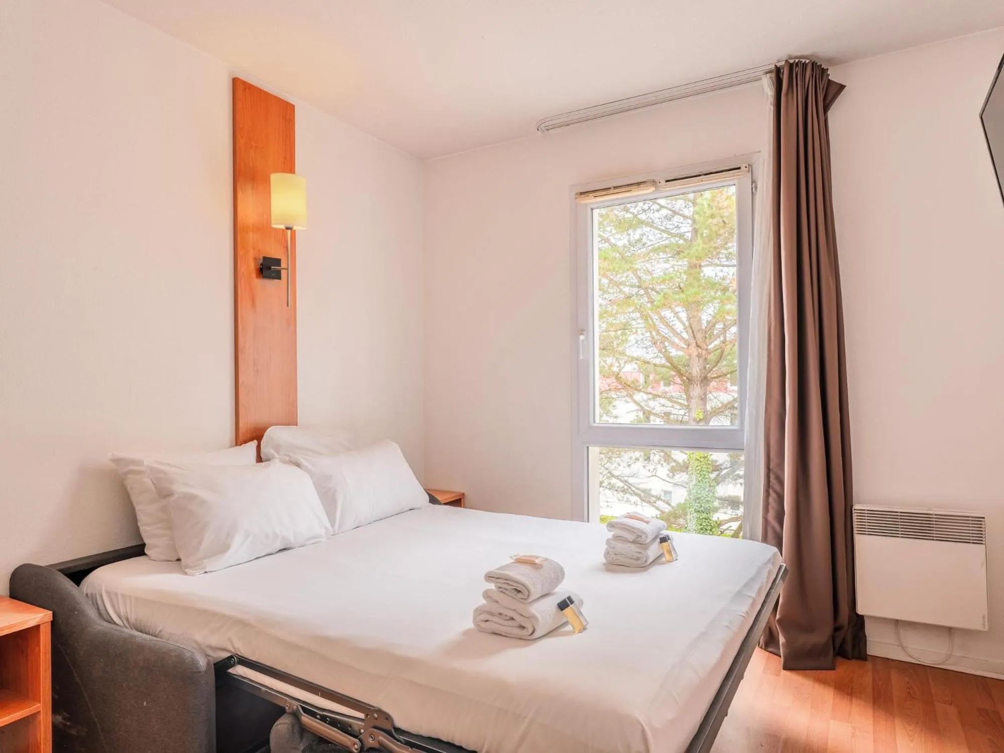 Bedroom, Bed in Séjours & Affaires Nantes La Beaujoire