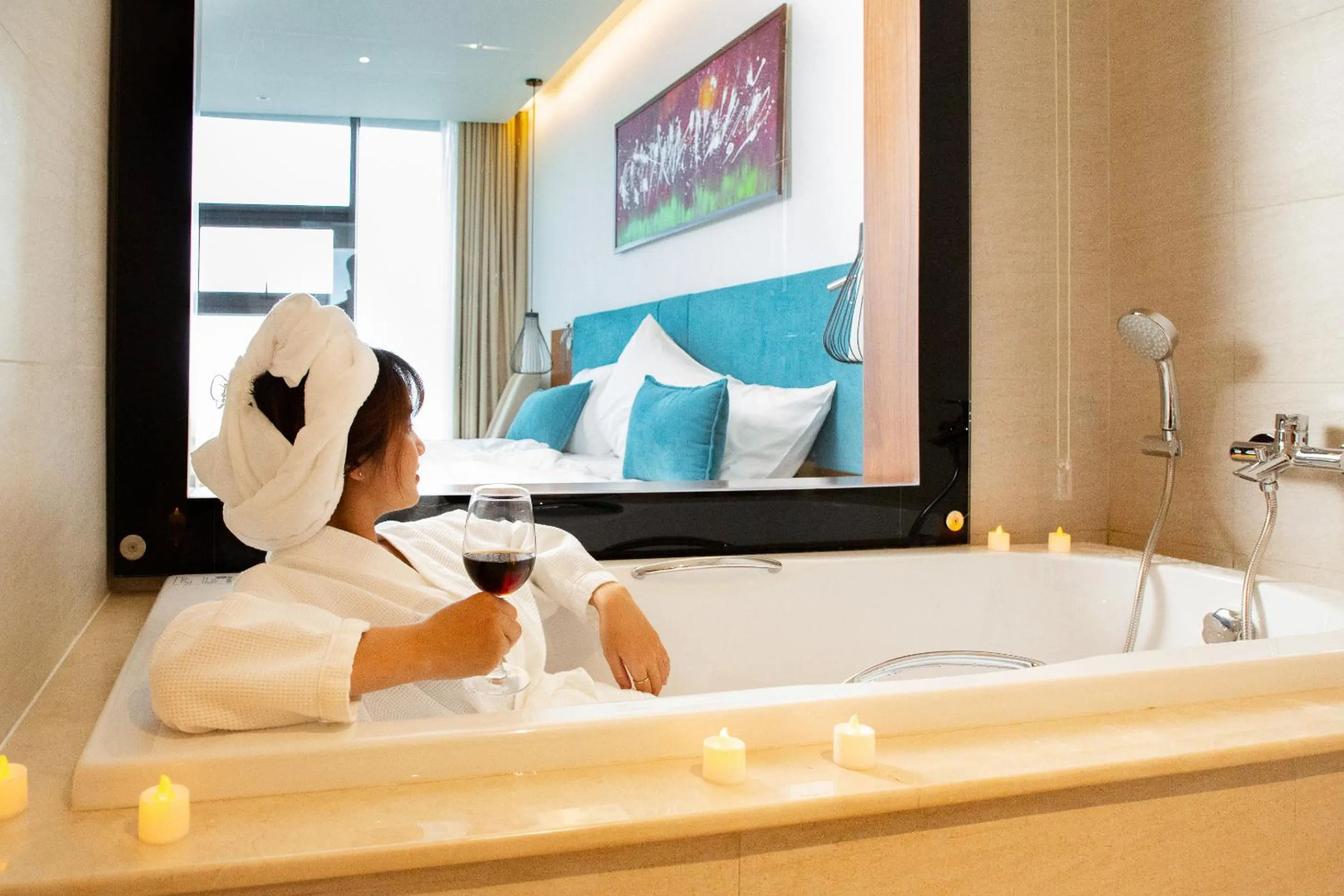 Bathroom, Bed in Maximilan Danang Beach Hotel