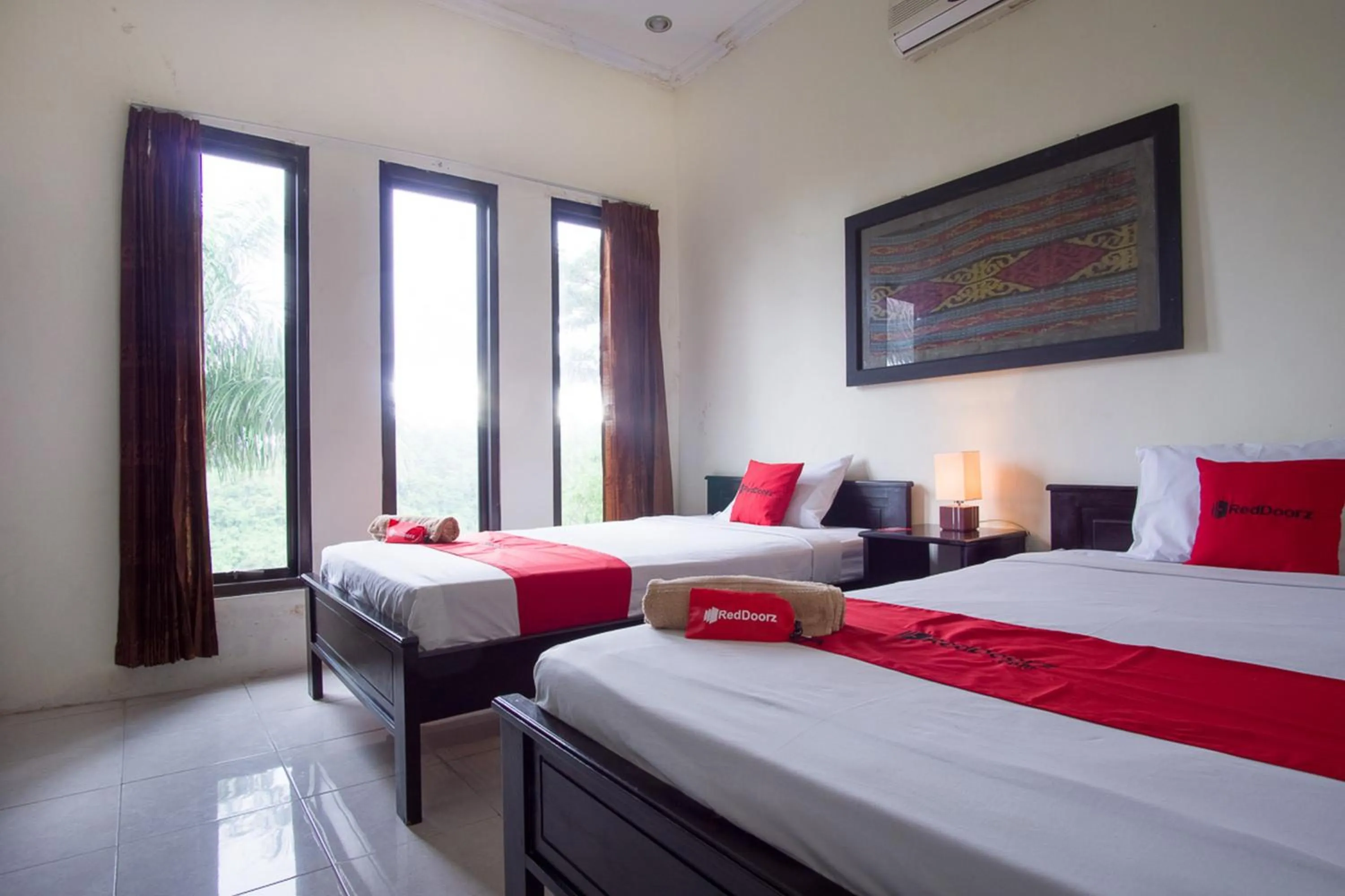 Bed in RedDoorz Syariah near Ngade Lake Ternate