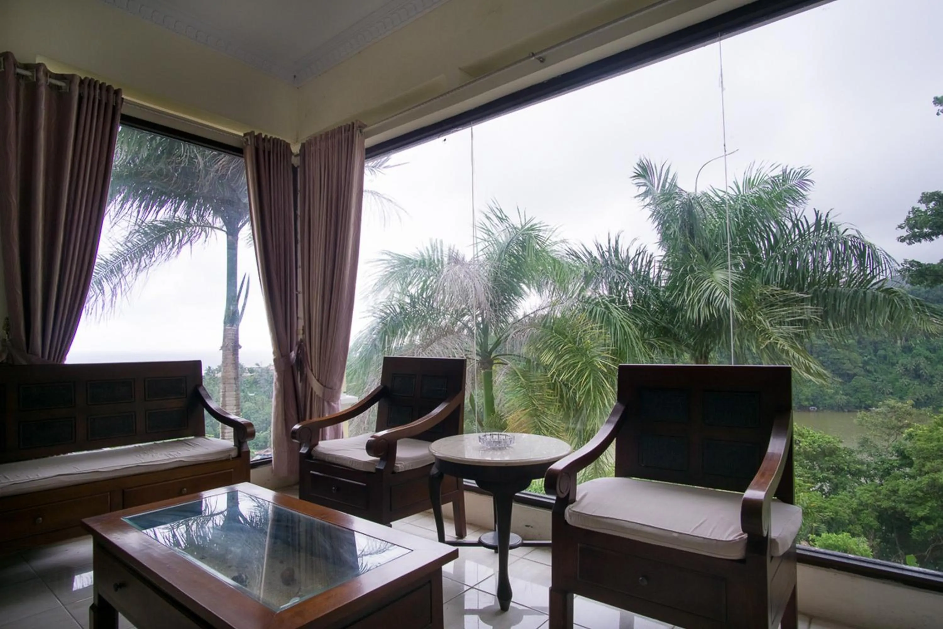 Seating area in RedDoorz Syariah near Ngade Lake Ternate