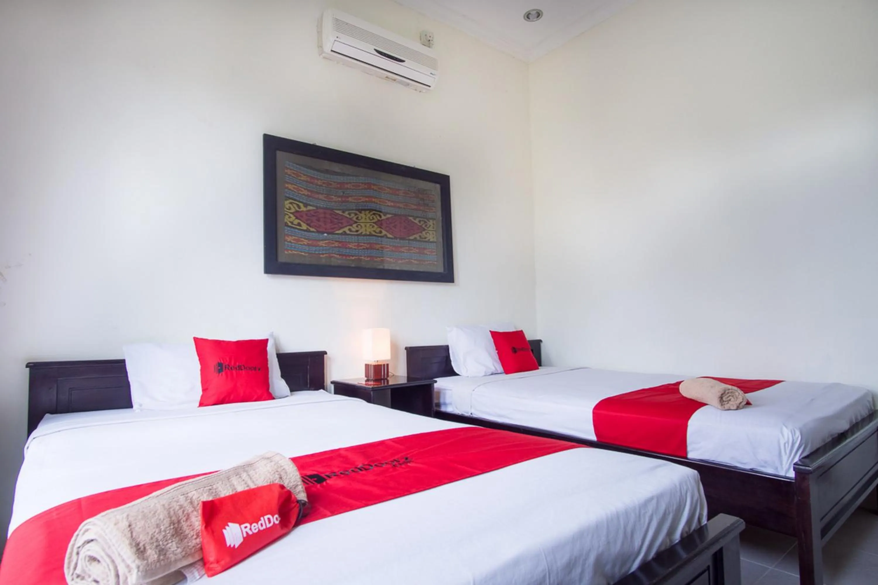 Bed in RedDoorz Syariah near Ngade Lake Ternate