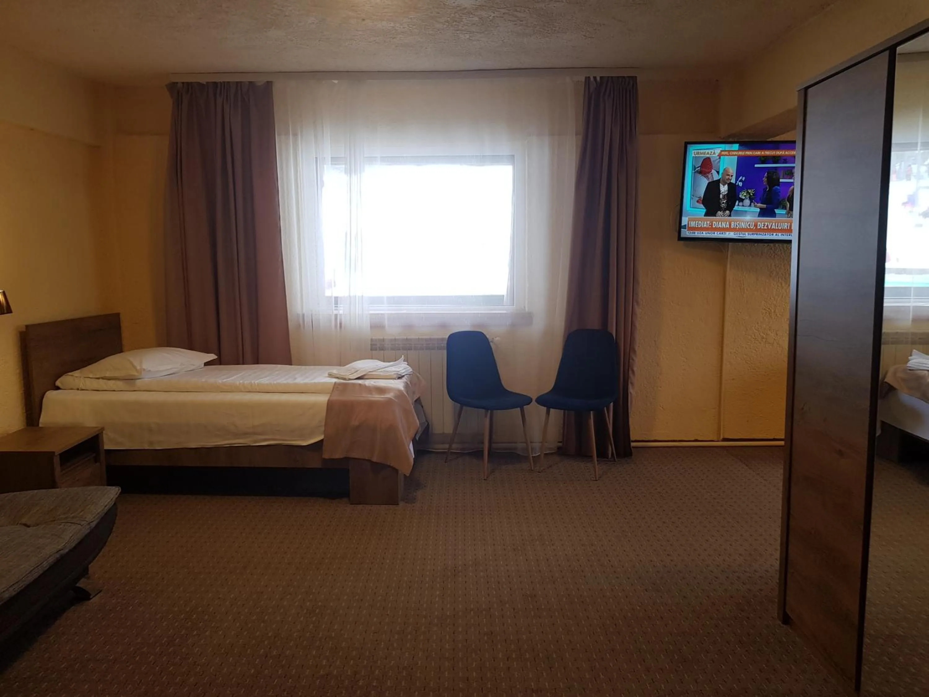 Living room, Bed in Cabana Fulg De Nea Predeal