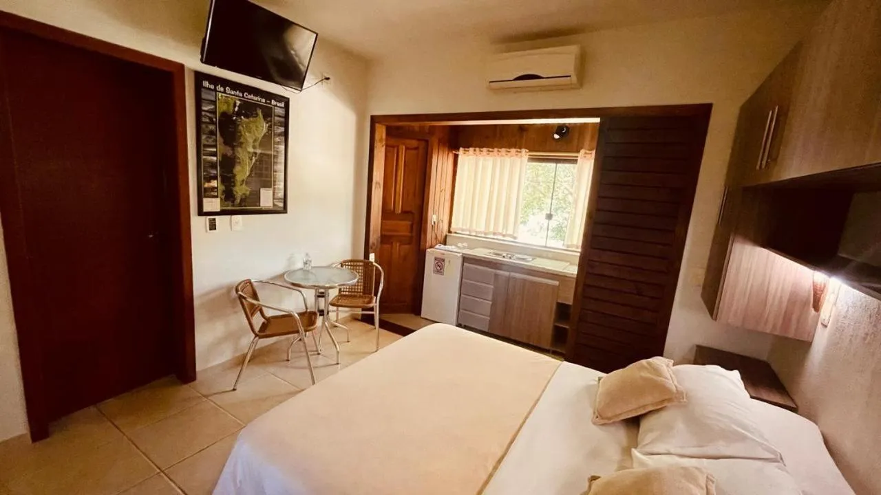 Bed in Pousada Ilha dos Anjos