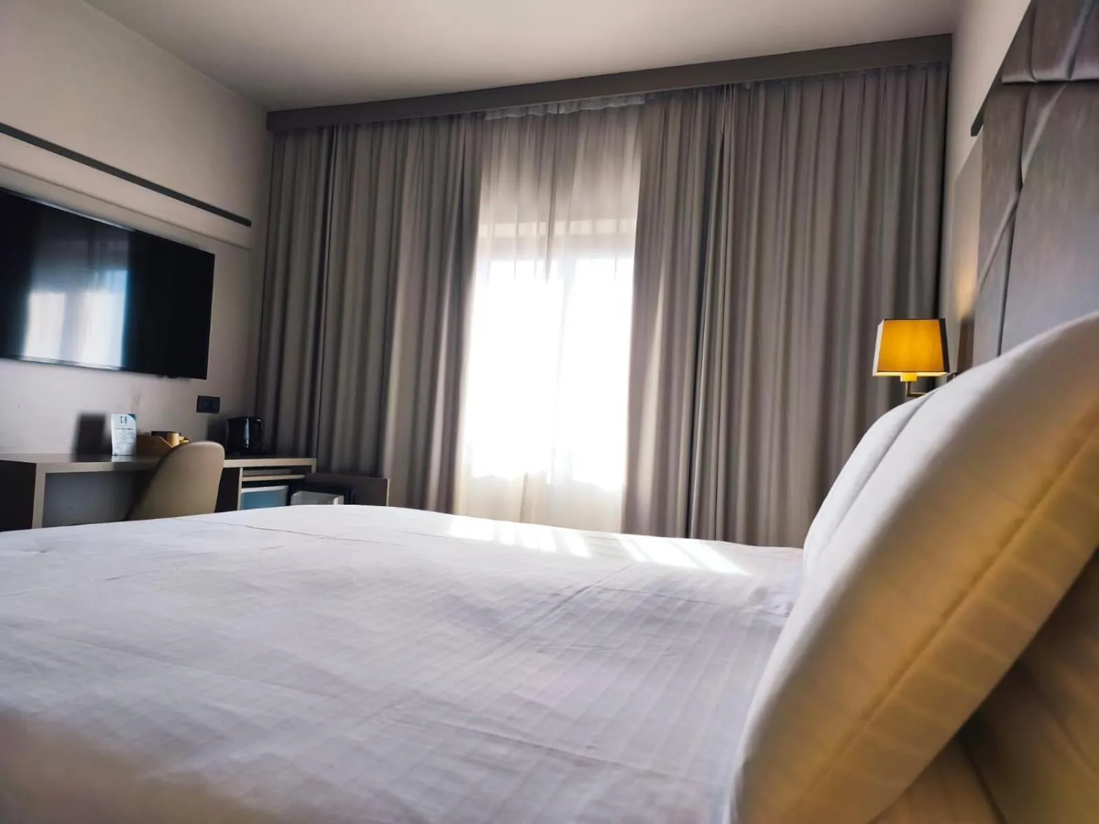 View (from property/room), Bed in DC HOTEL INTERNATIONAL