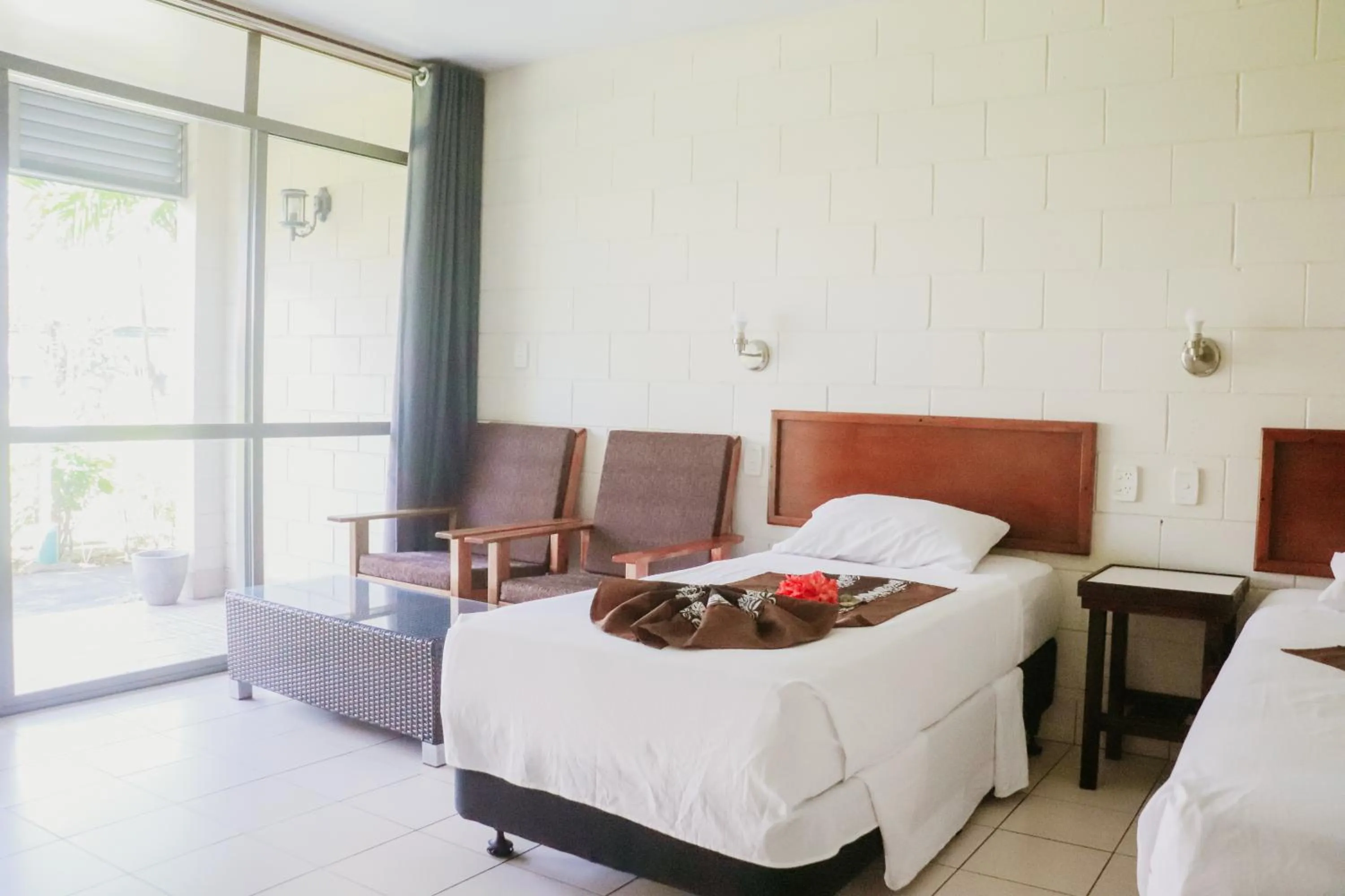 Bed in Hotel Millenia Samoa