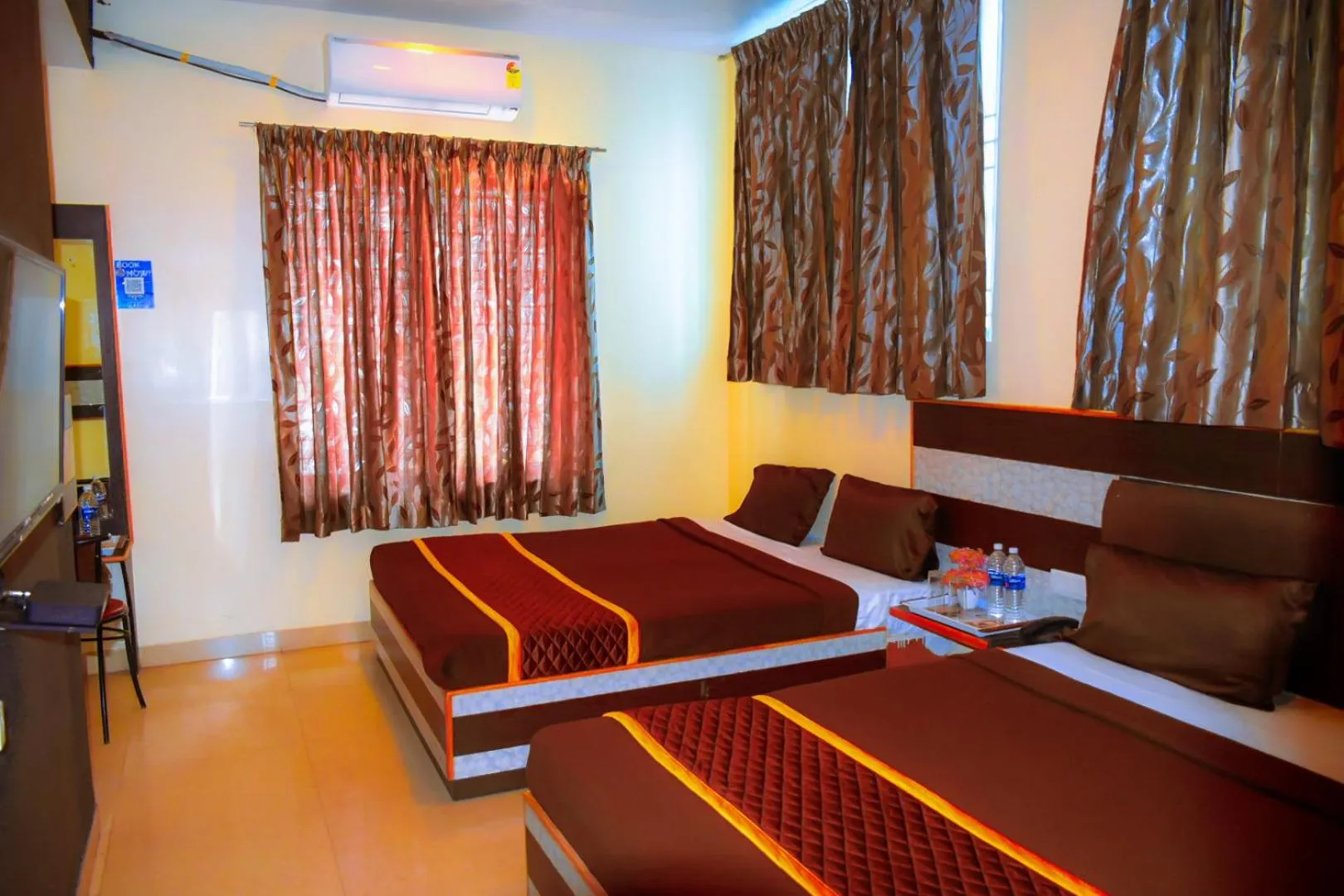 Photo of the whole room, Bed in Madurai Grands Inn