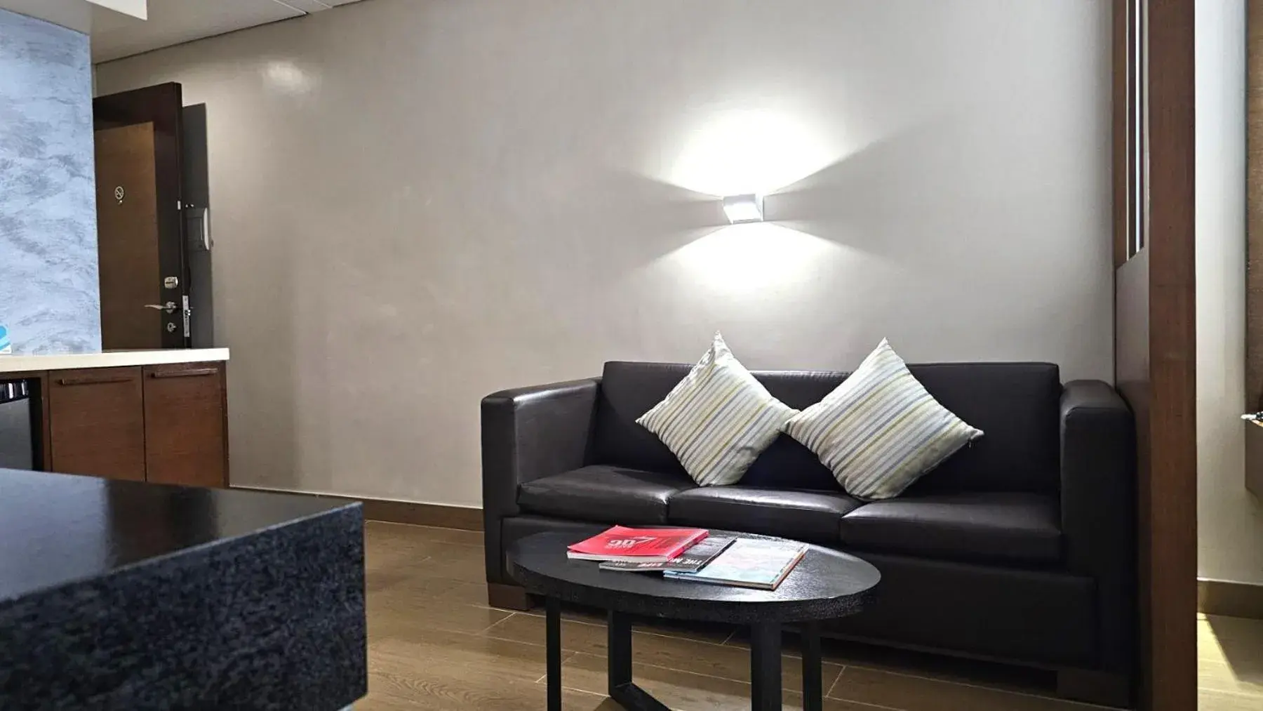 Living room in Microtel by Wyndham Acropolis Living room in Microtel by Wyndham Acropolis