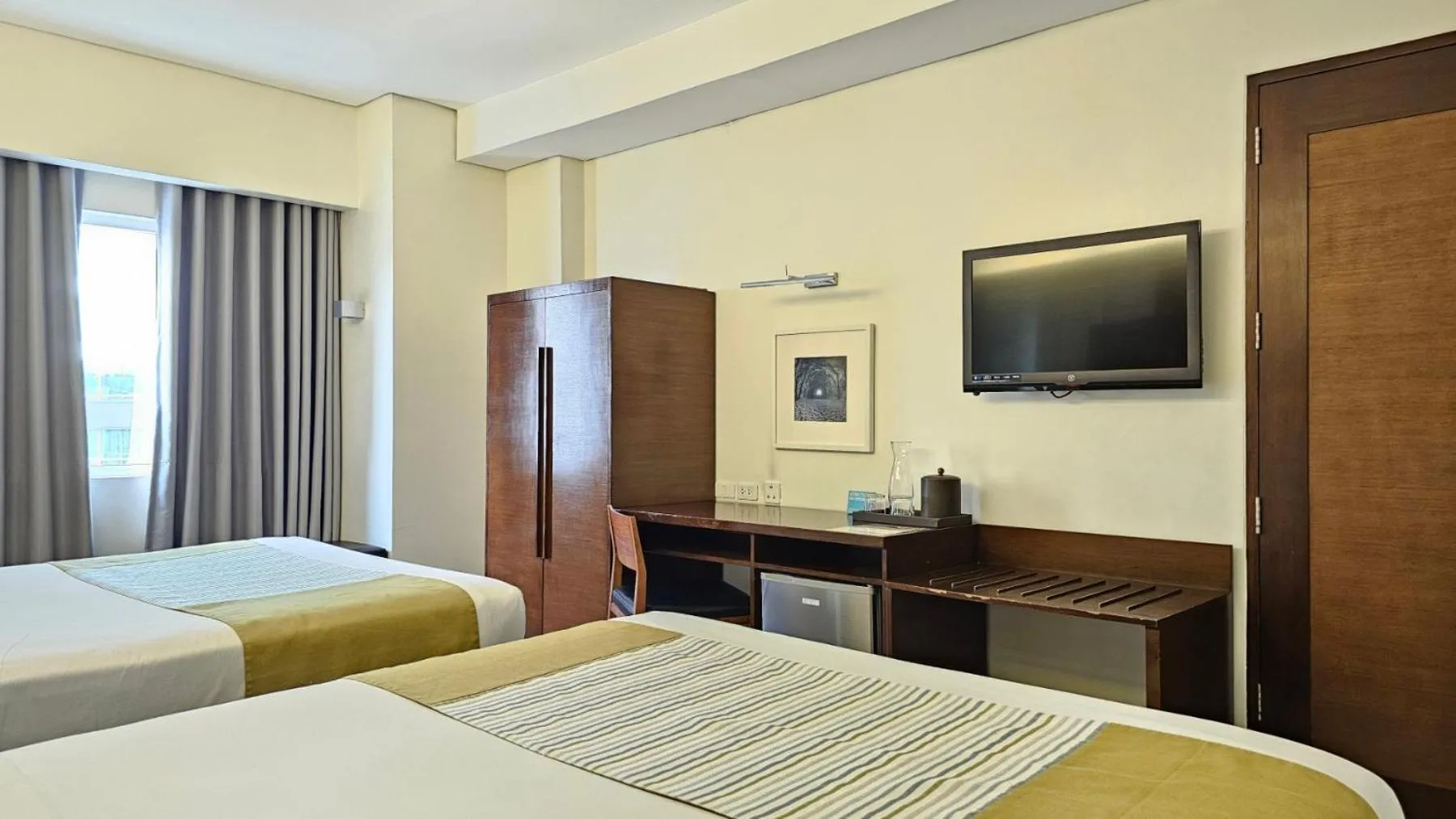 Bed in Microtel by Wyndham Acropolis