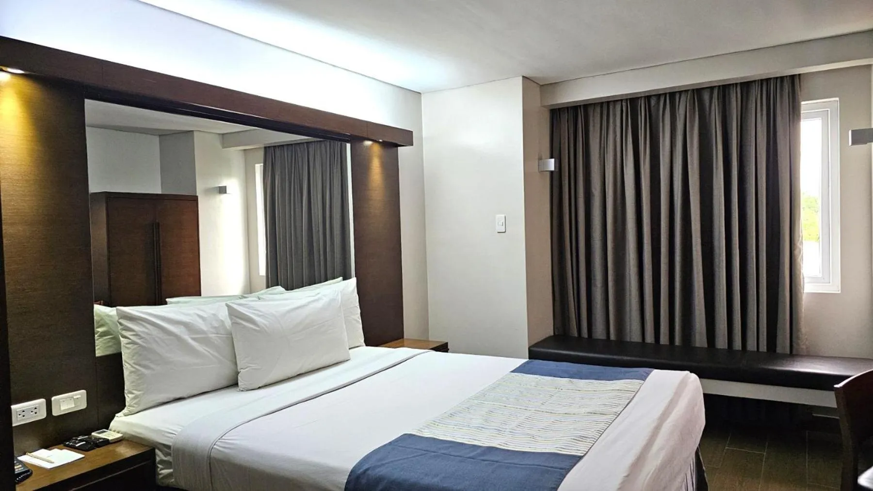 Bed in Microtel by Wyndham Acropolis