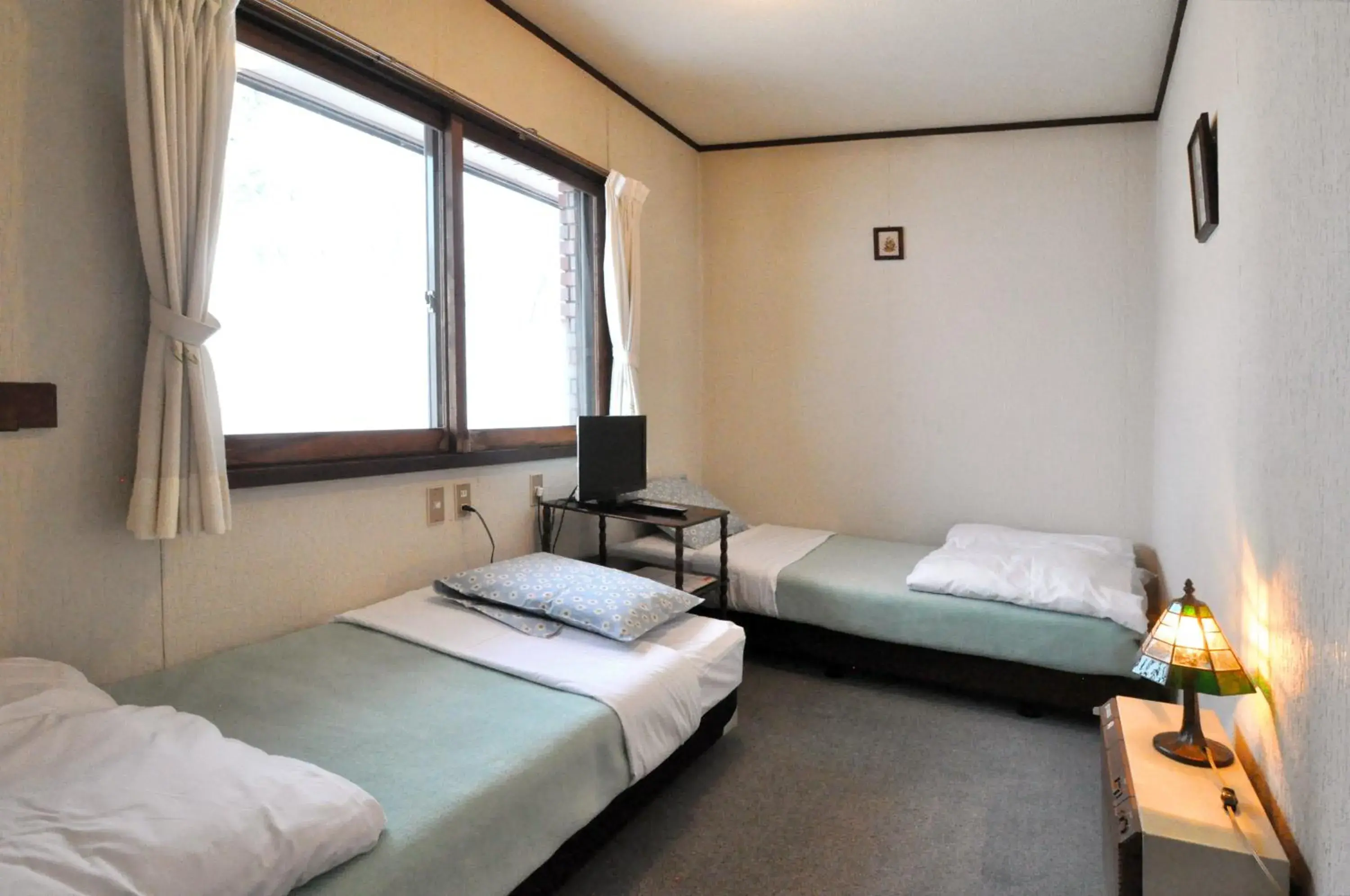 Twin Room with Bathroom - single occupancy in Pension Risuno Koya Twin Room with Bathroom - single occupancy in Pension Risuno Koya
