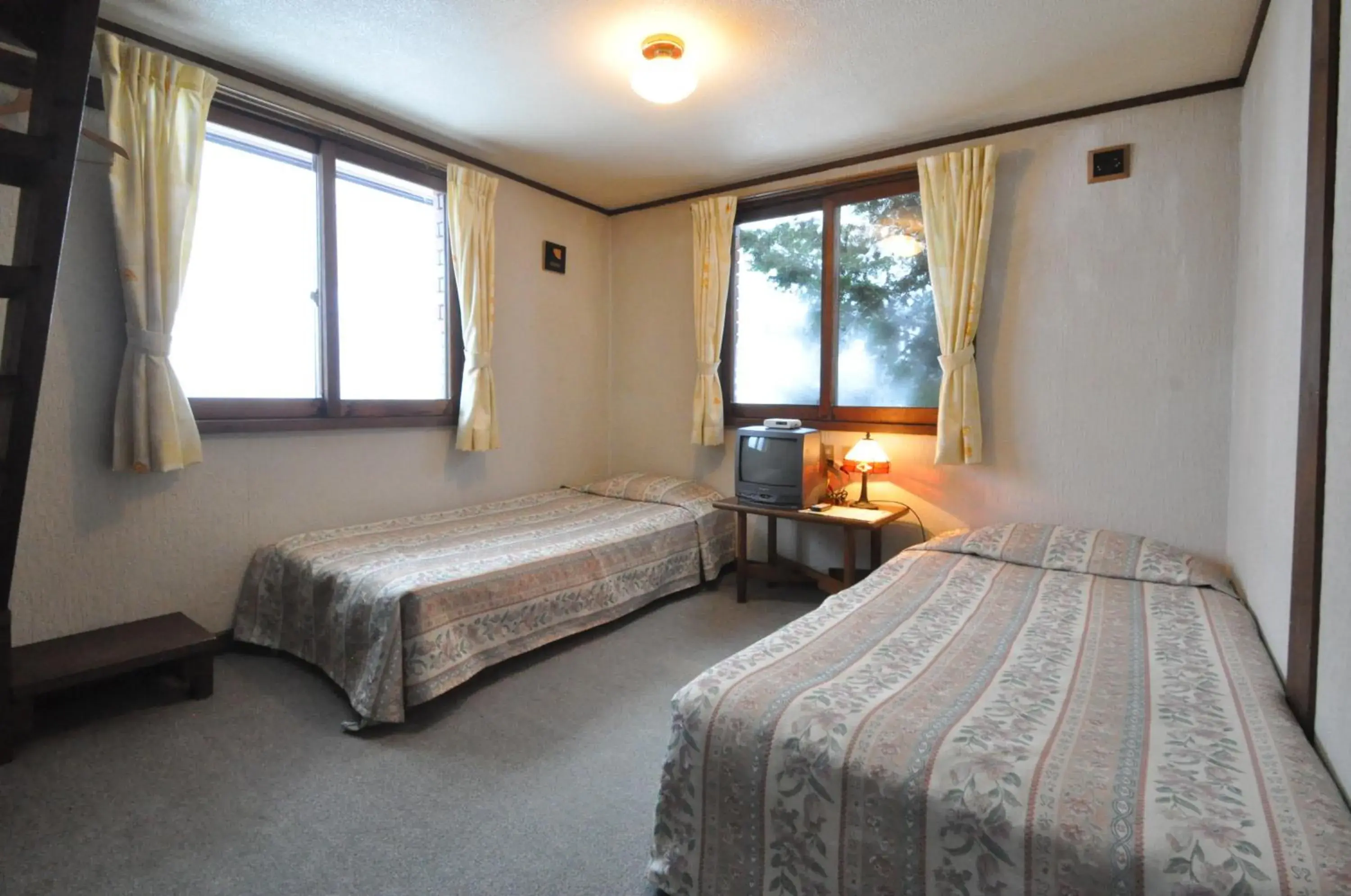 Quadruple Room with Shared Bathroom in Pension Risuno Koya Quadruple Room with Shared Bathroom in Pension Risuno Koya