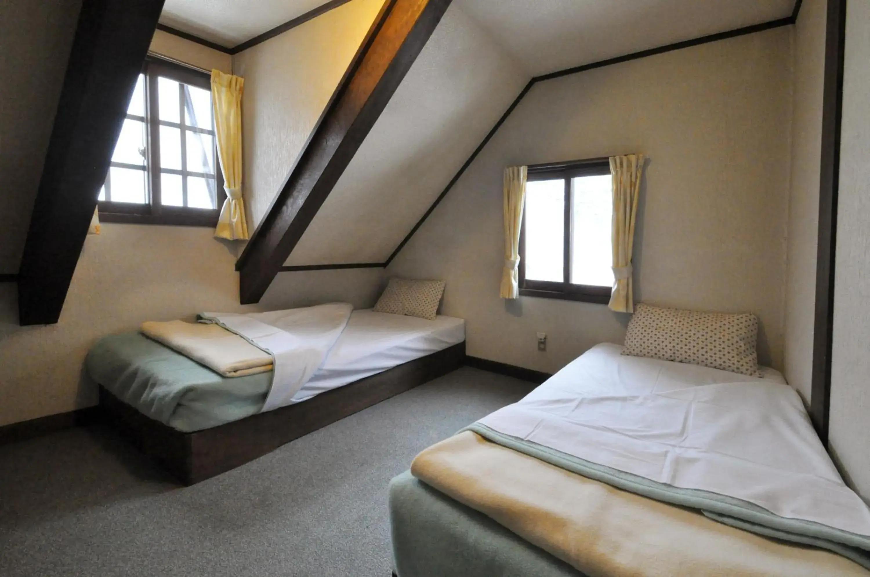 Quadruple Room with Shared Bathroom in Pension Risuno Koya Quadruple Room with Shared Bathroom in Pension Risuno Koya