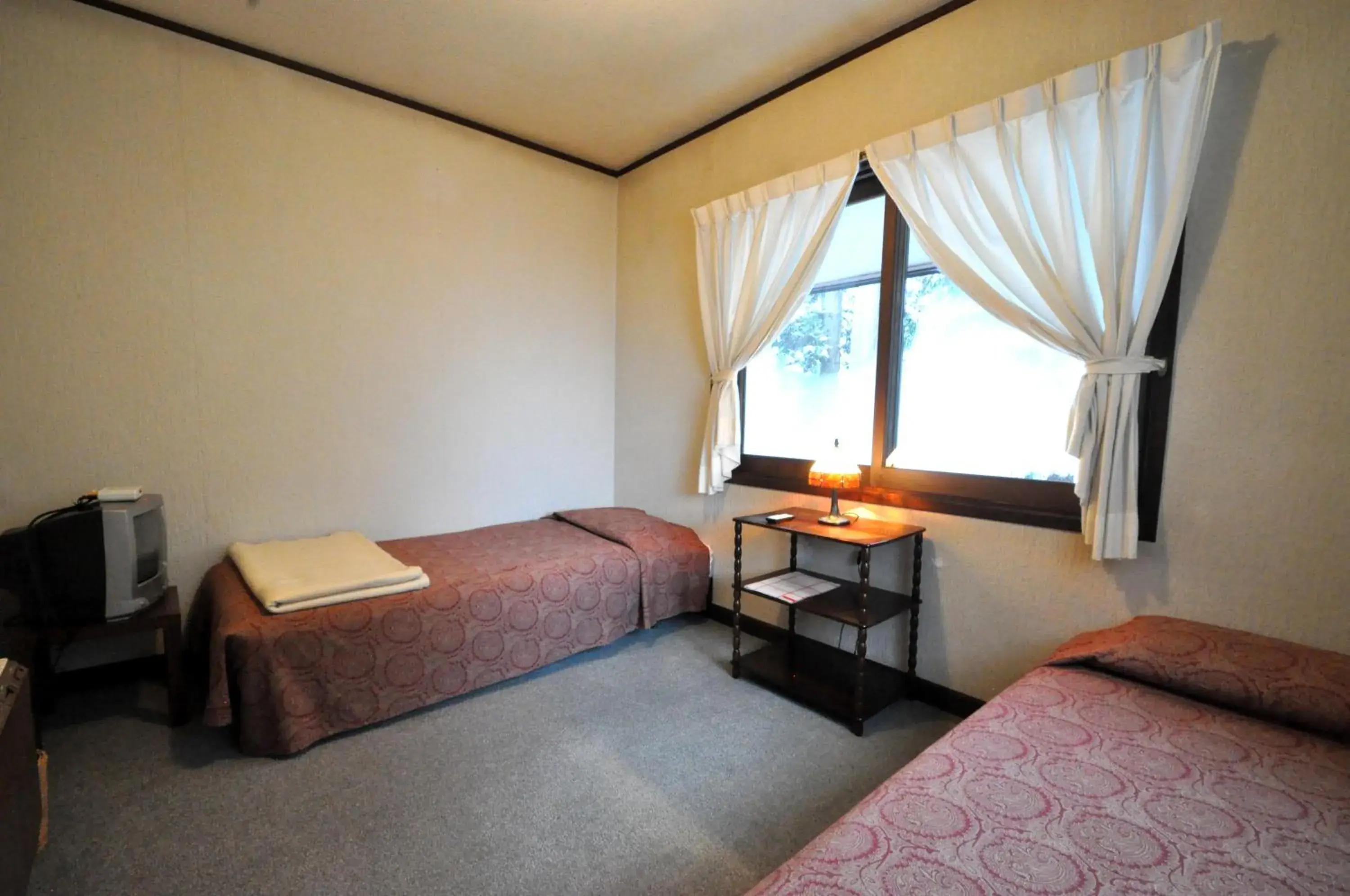 Twin Room with Shared Bathroom - single occupancy in Pension Risuno Koya Twin Room with Shared Bathroom - single occupancy in Pension Risuno Koya