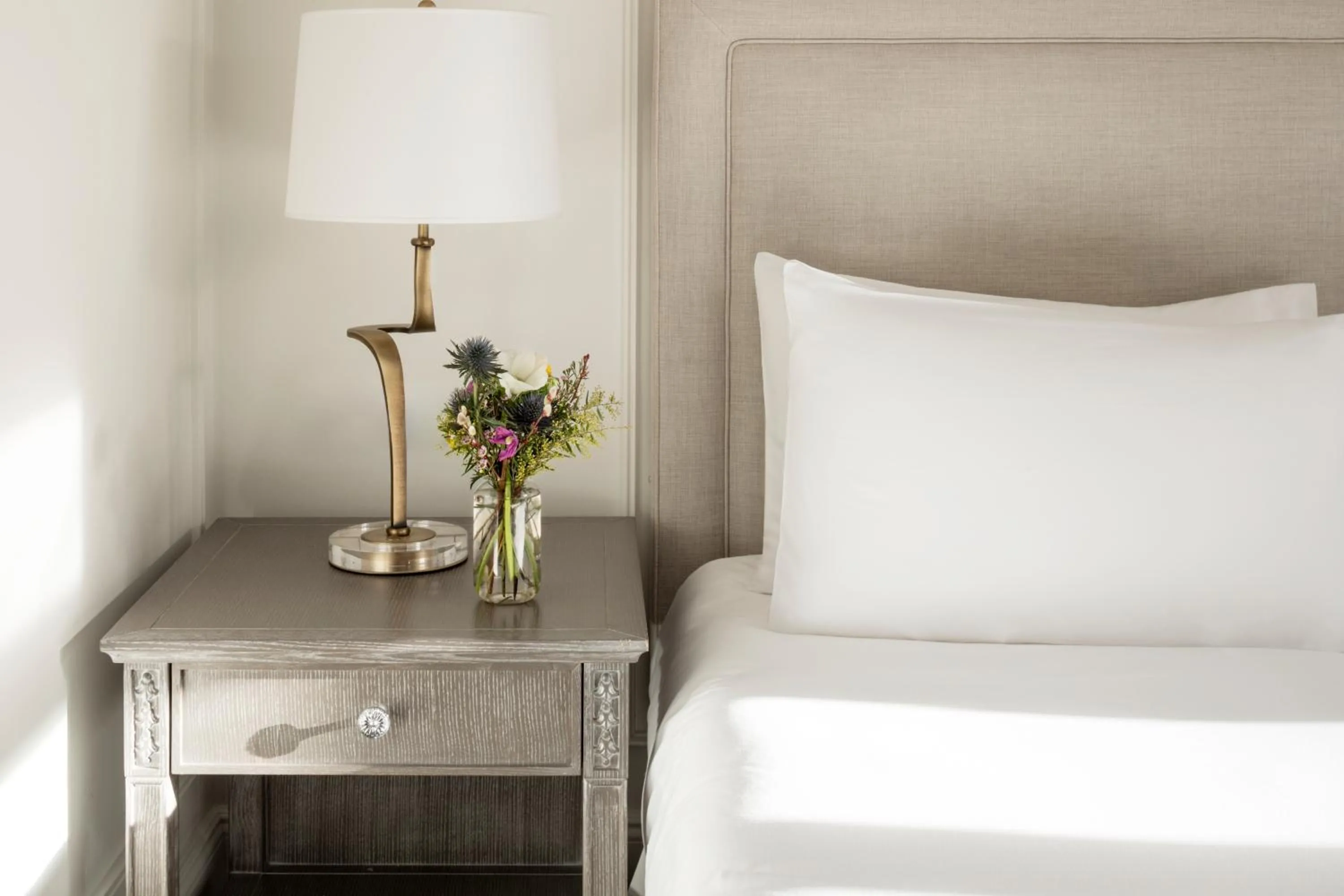 Bed in Hôtel du Louvre, in The Unbound Collection by Hyatt