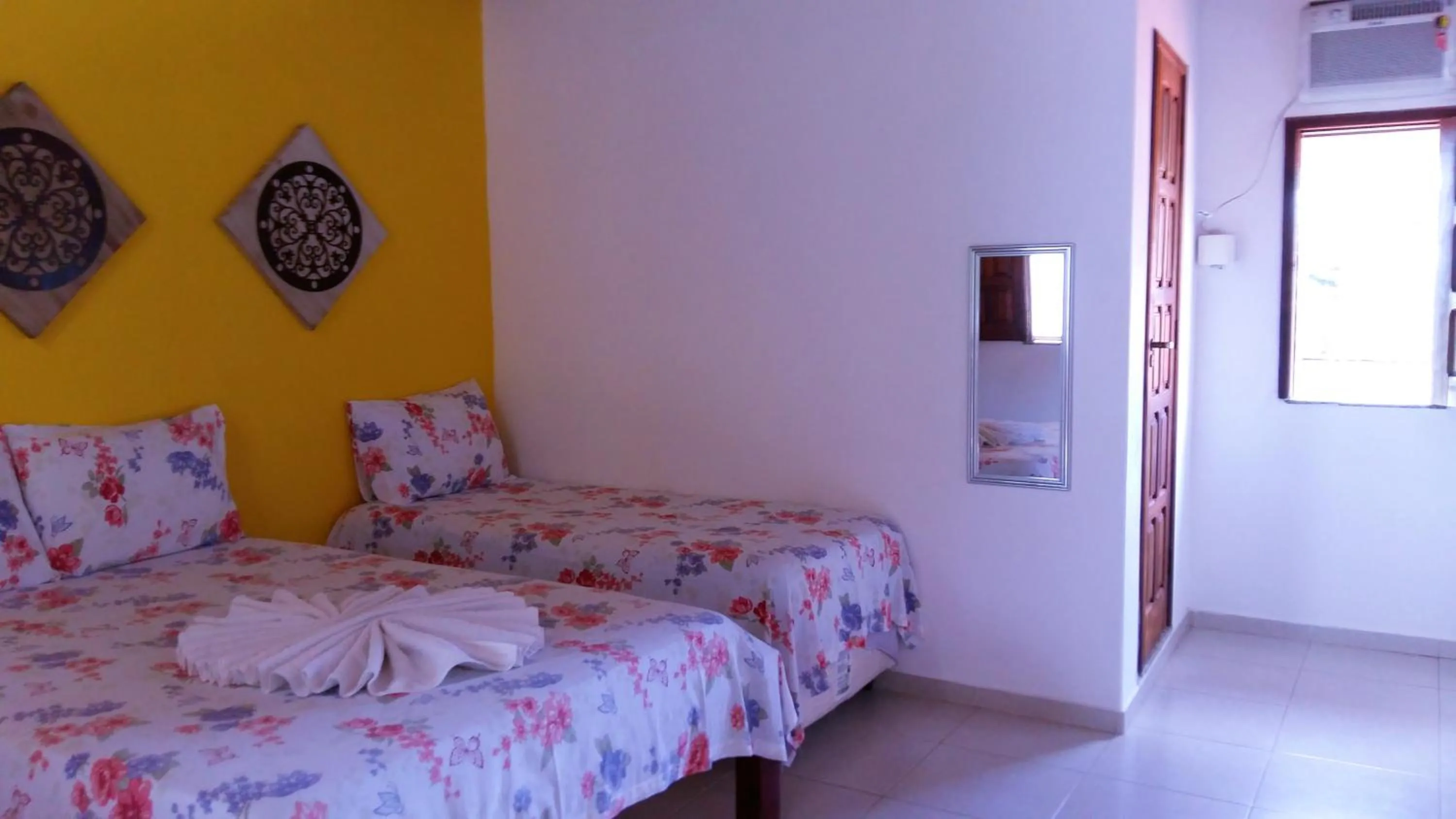 Bed in Pousada Água Viva