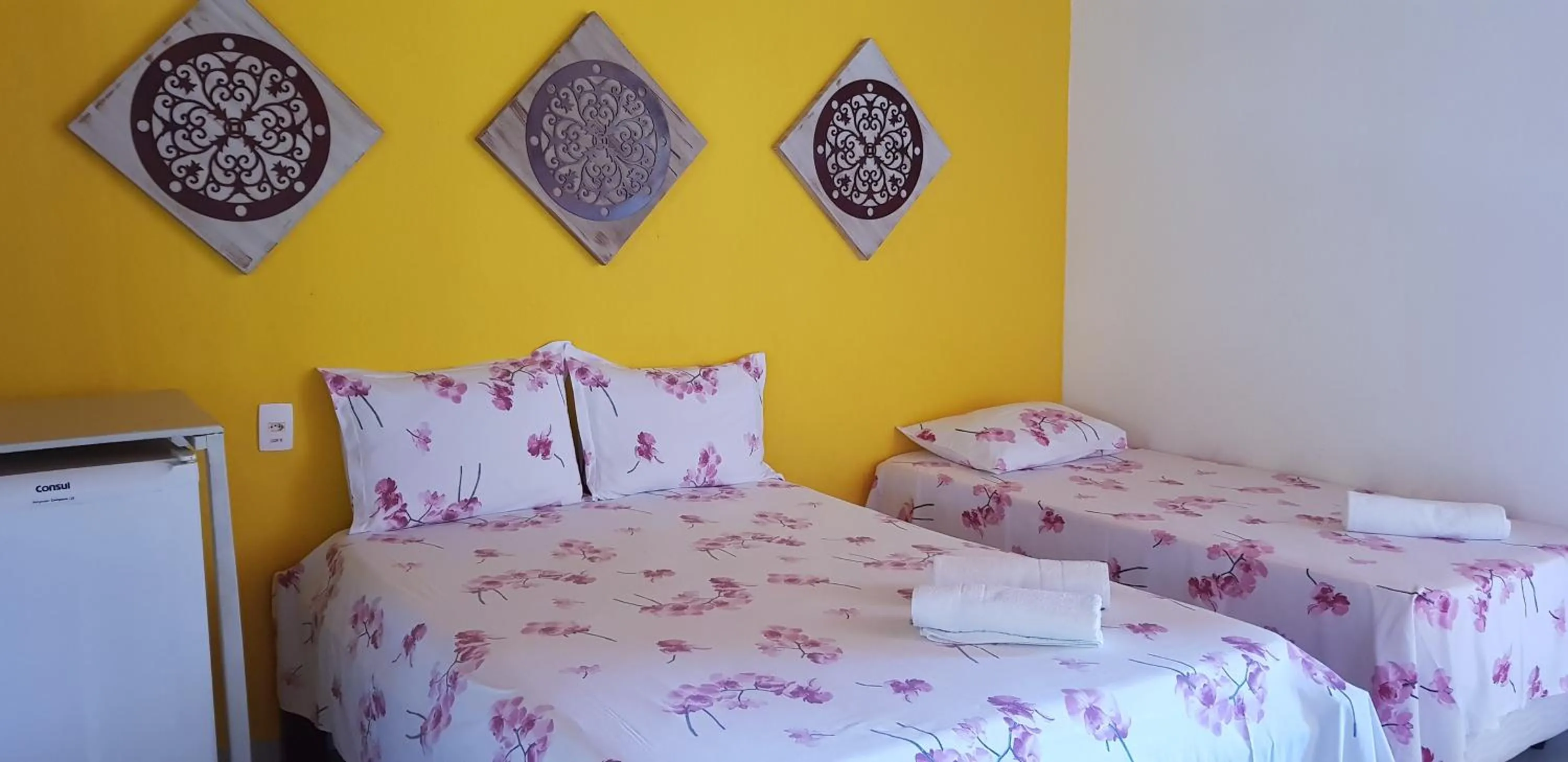 Bed in Pousada Água Viva