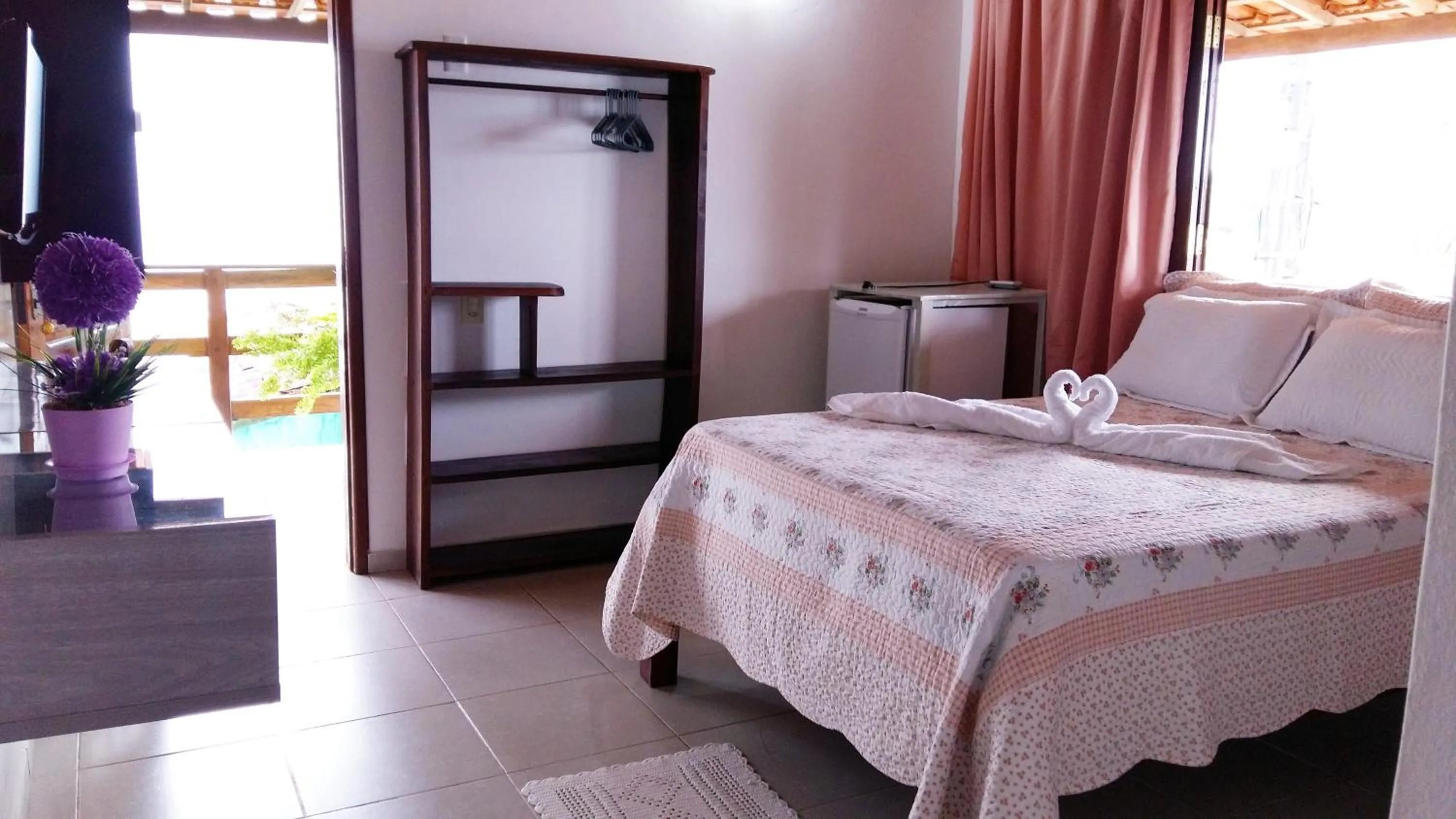 Bed in Pousada Água Viva