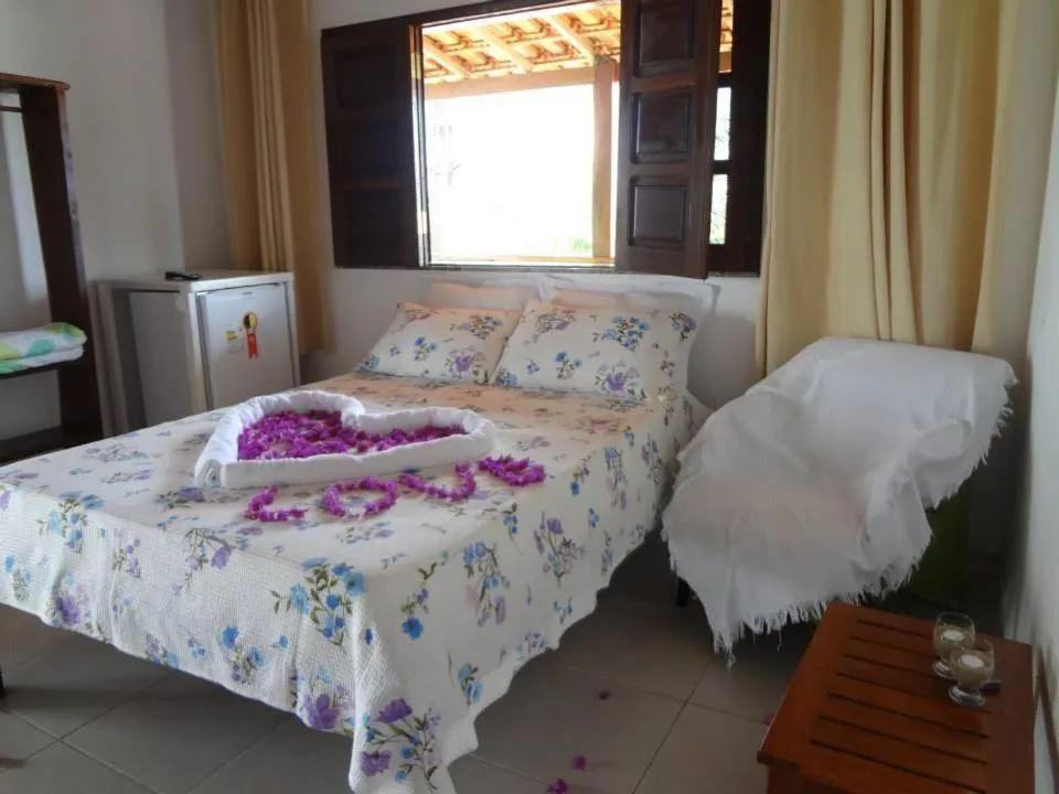 Bed in Pousada Água Viva