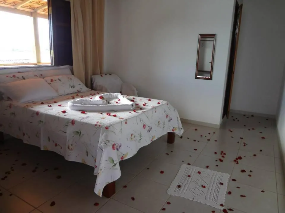 Bed in Pousada Água Viva