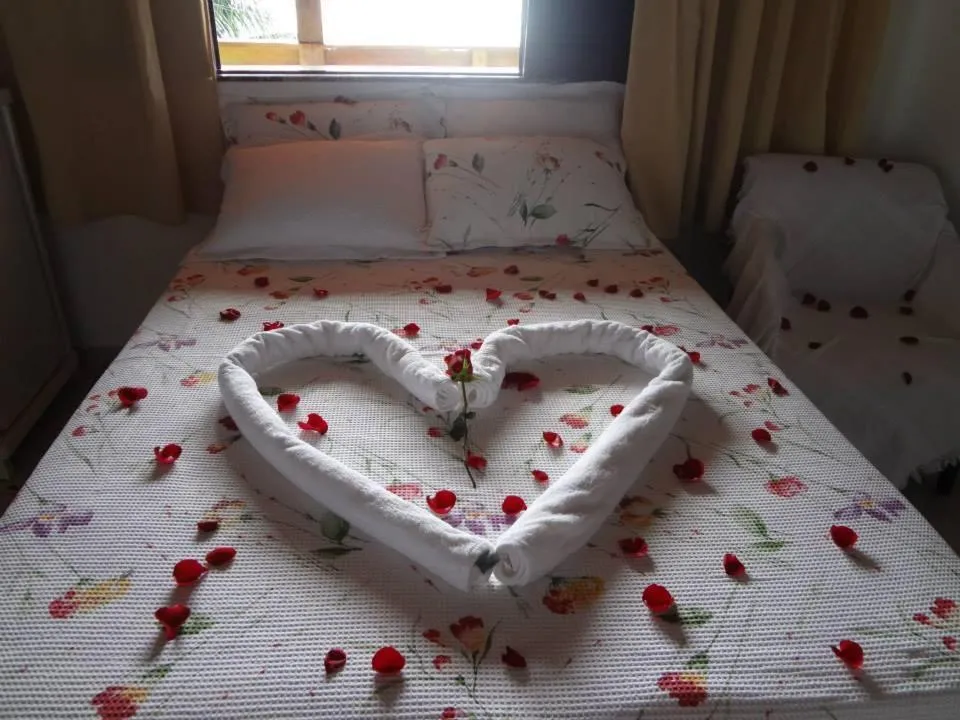 Bed in Pousada Água Viva