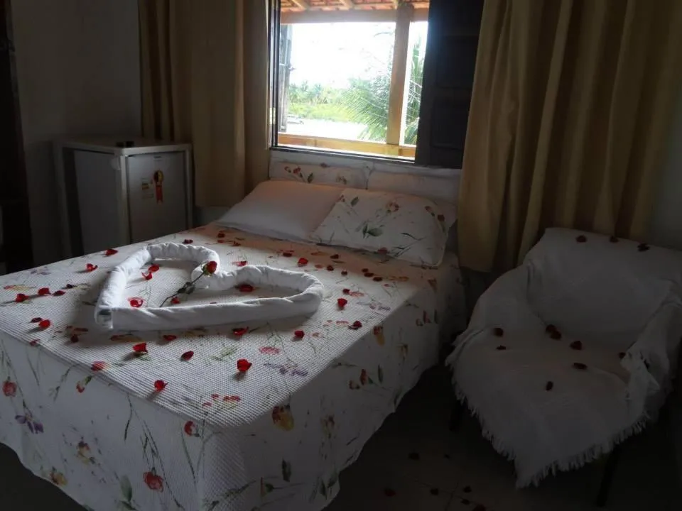 Bed in Pousada Água Viva