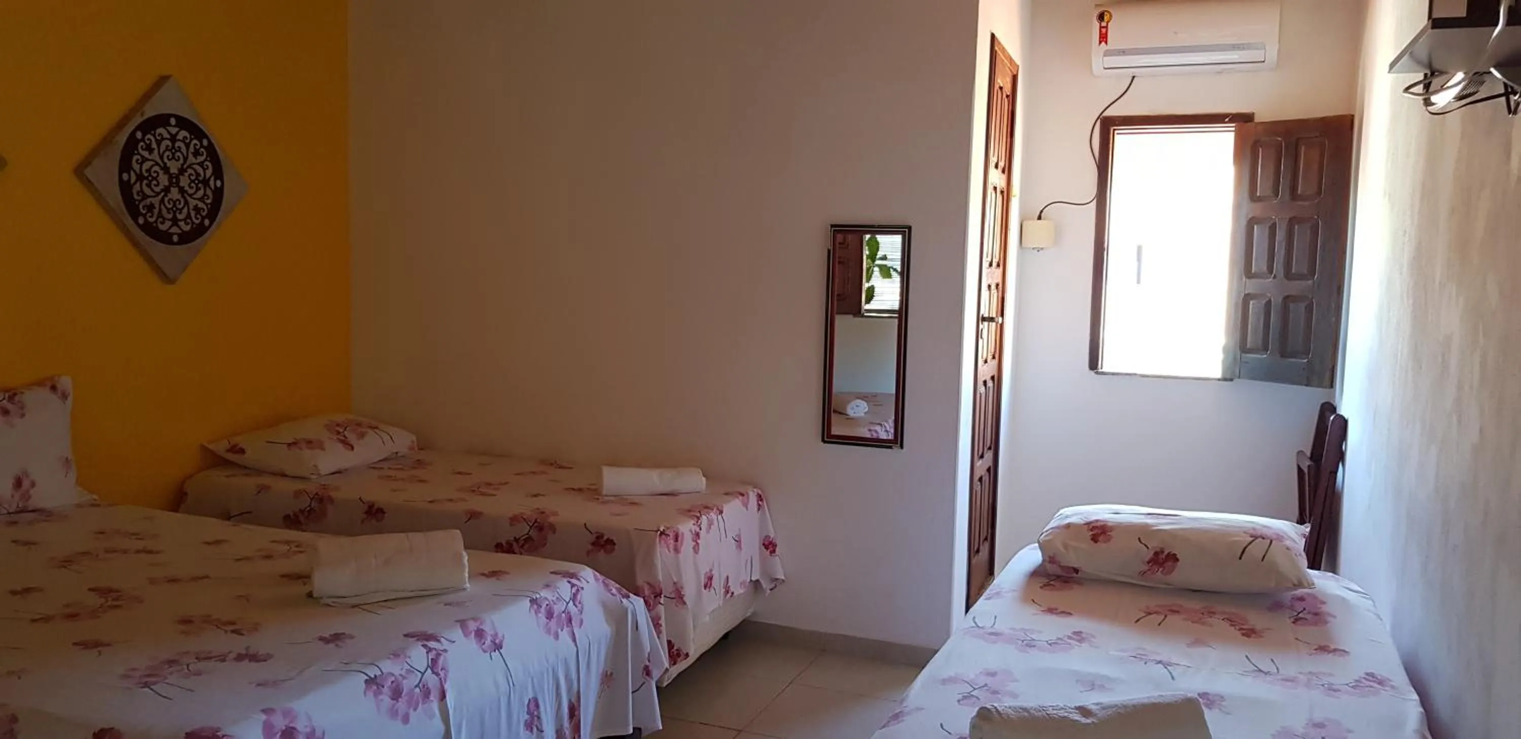 Bed in Pousada Água Viva