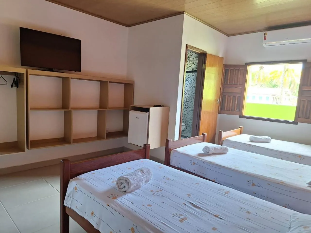 Bed in Pousada Água Viva