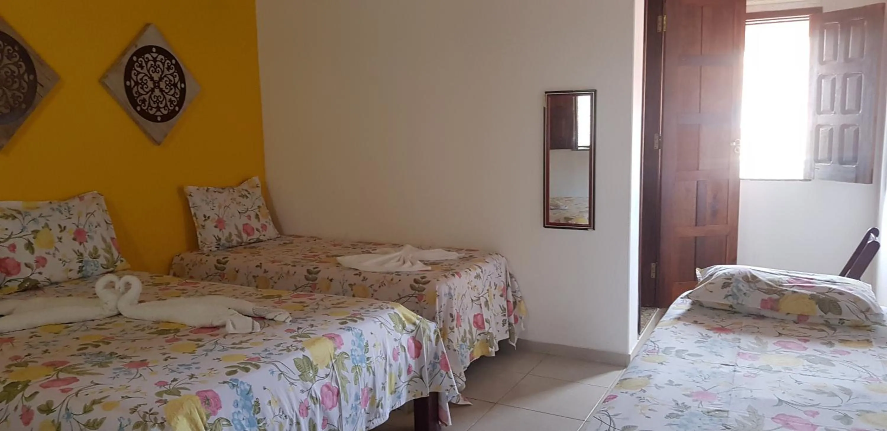 Bed in Pousada Água Viva