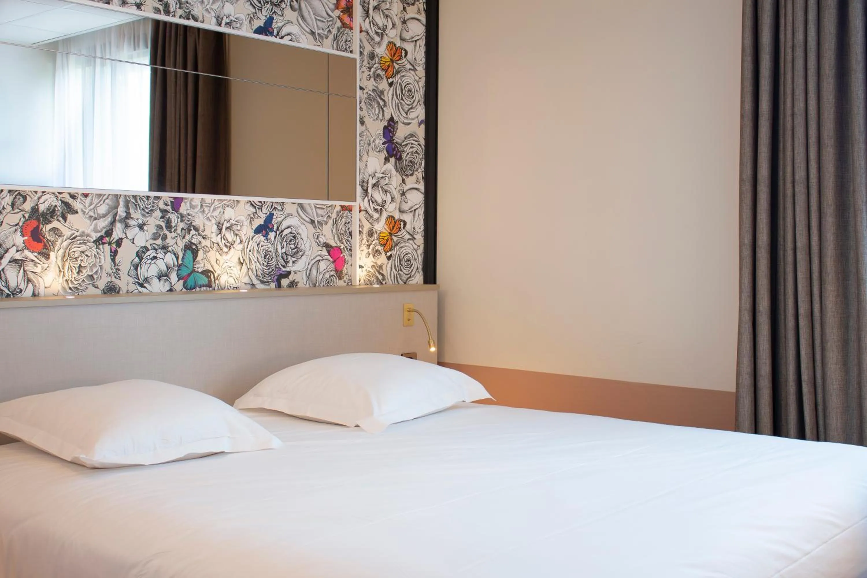 Bedroom, Bed in Brit Hotel Nantes La Beaujoire Parc Expo