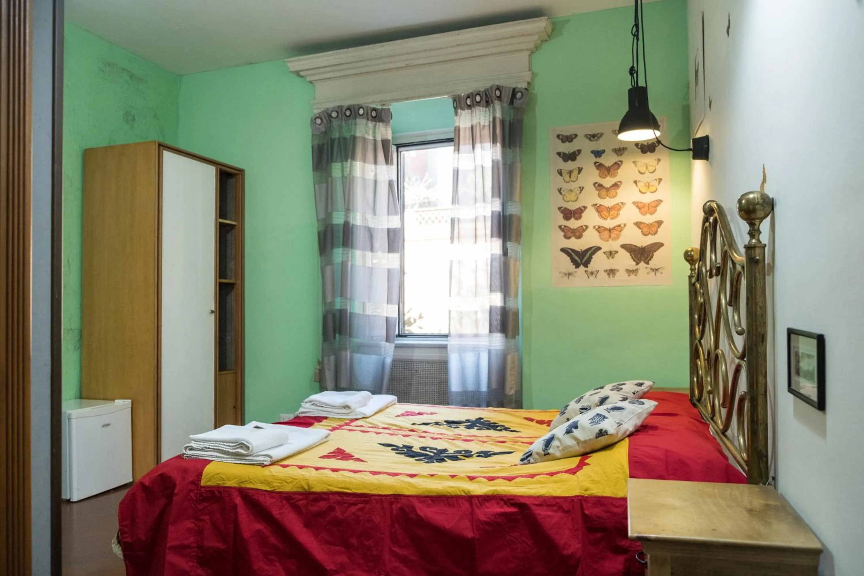 Bed in Signor Suite Colosseo