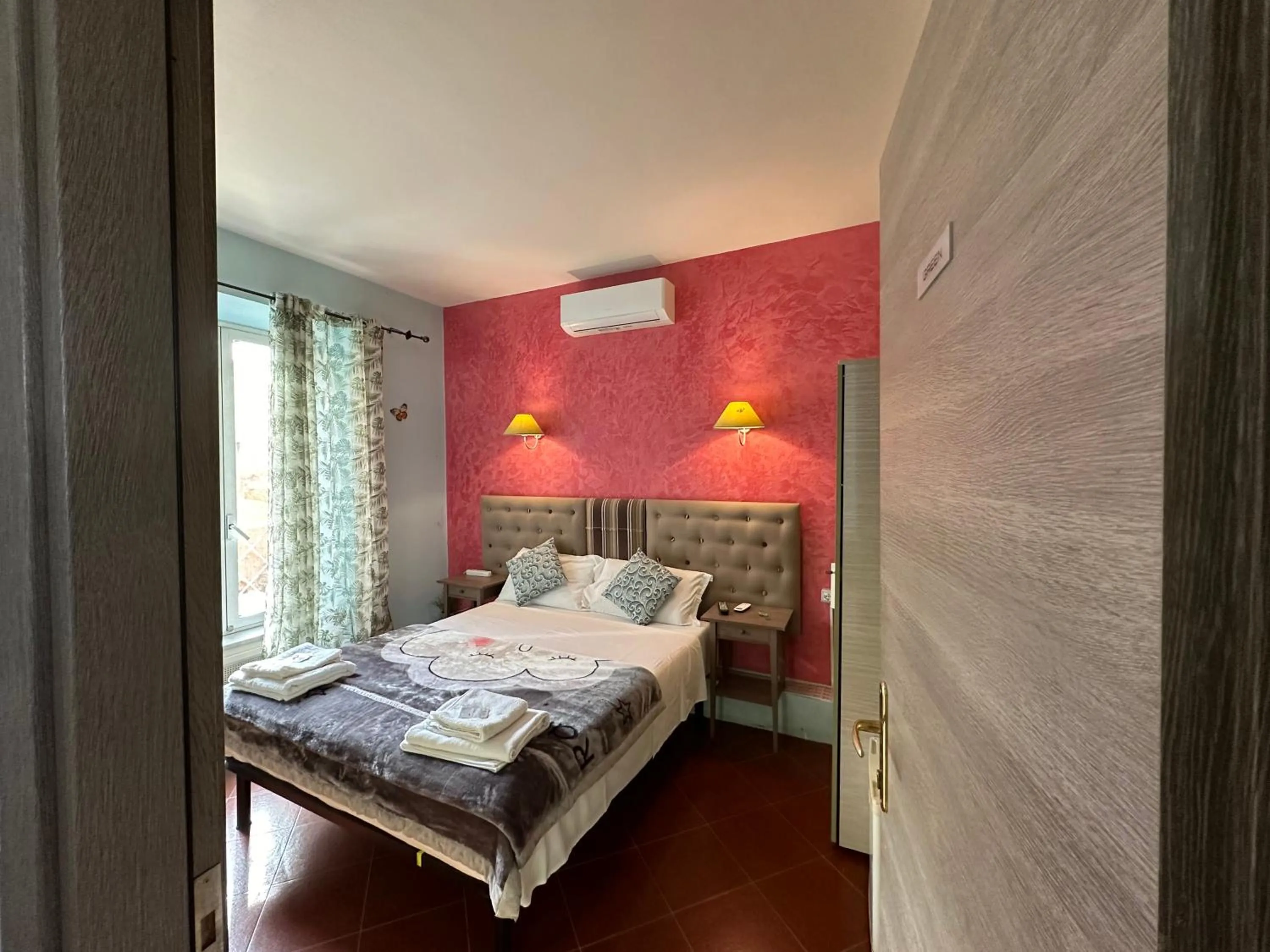 Bed in Signor Suite Colosseo