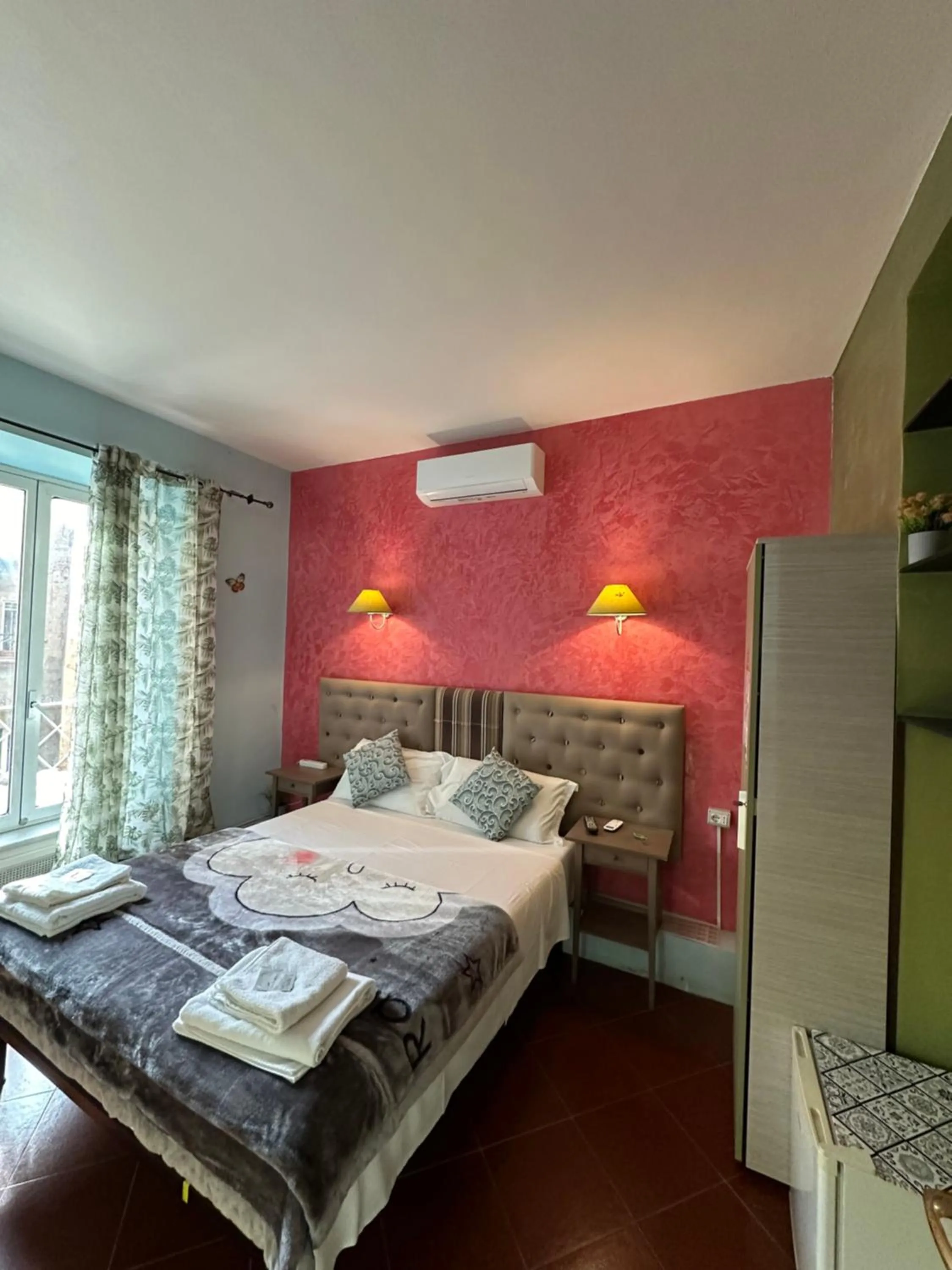 Bed in Signor Suite Colosseo