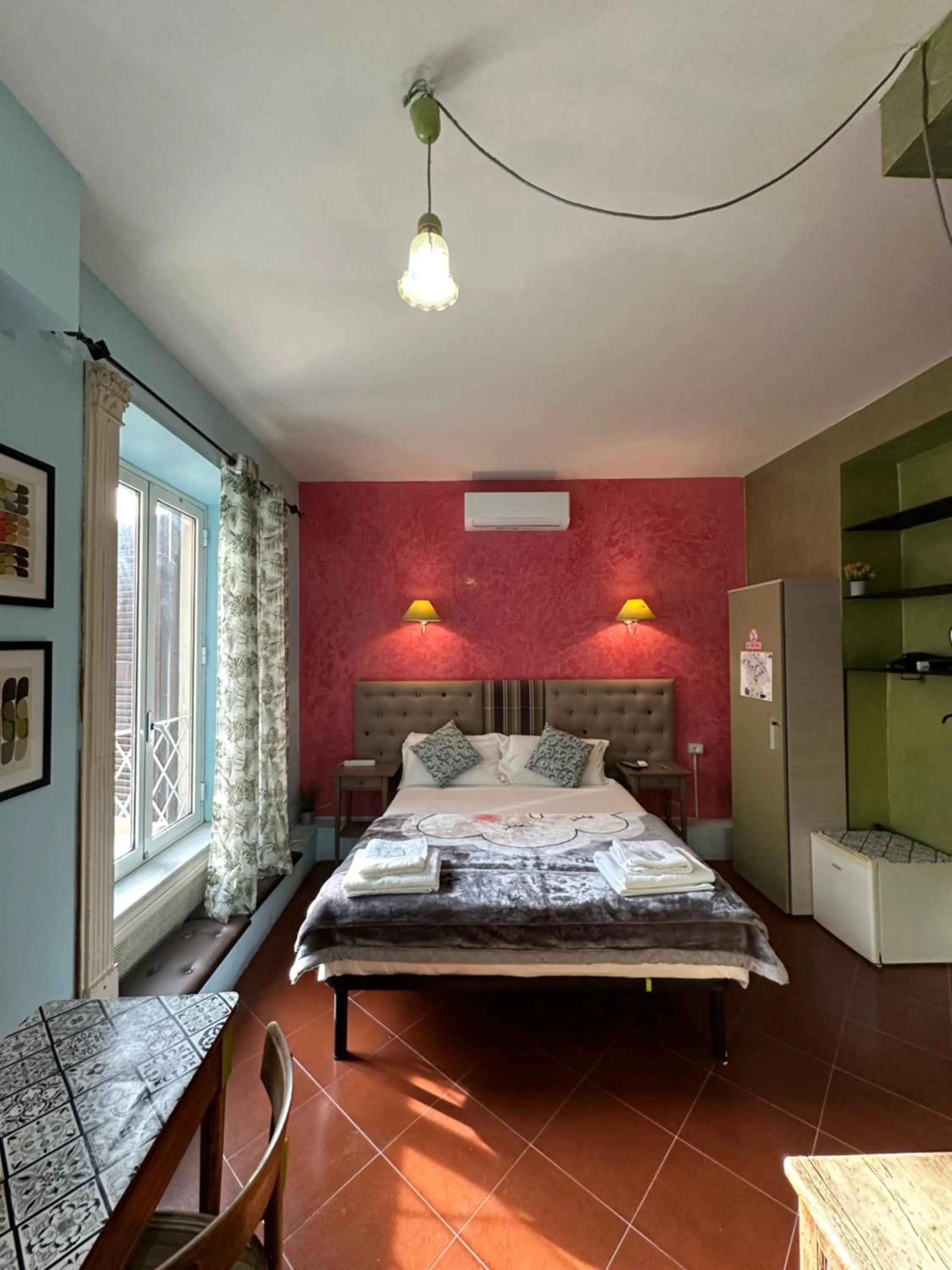 Bed in Signor Suite Colosseo