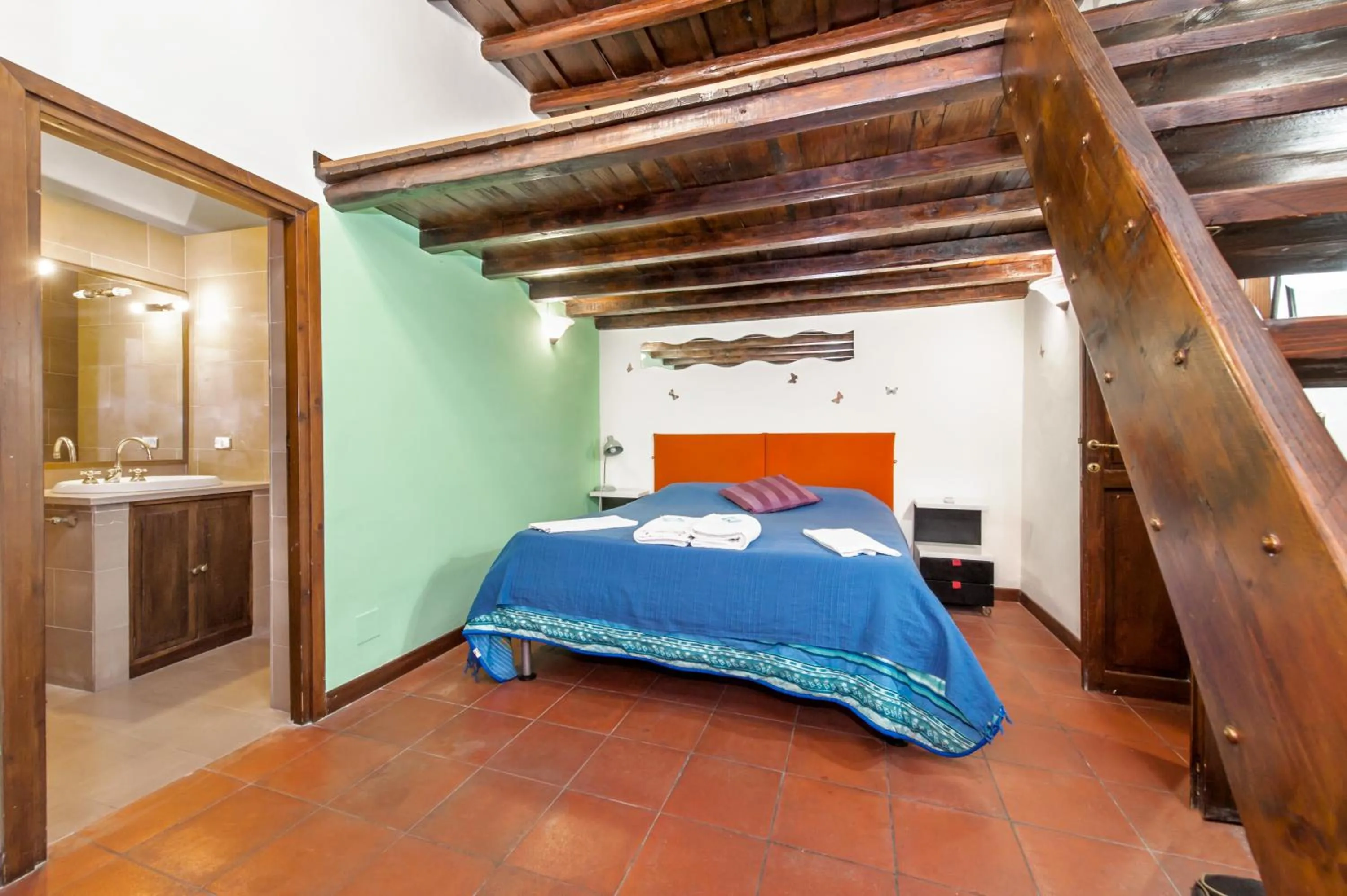 Bed in Signor Suite Colosseo