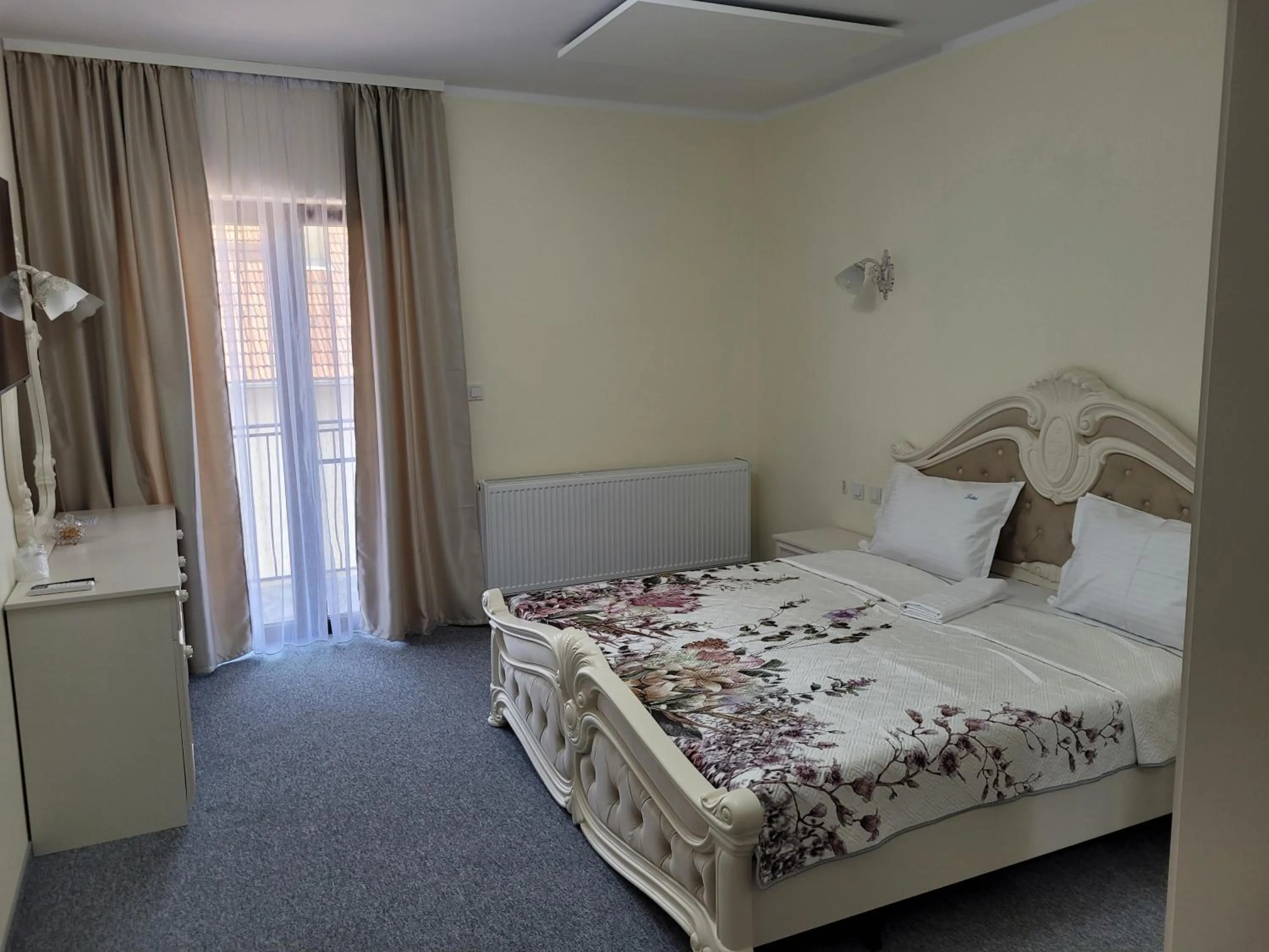 Photo of the whole room, Bed in LOTUS Boutique