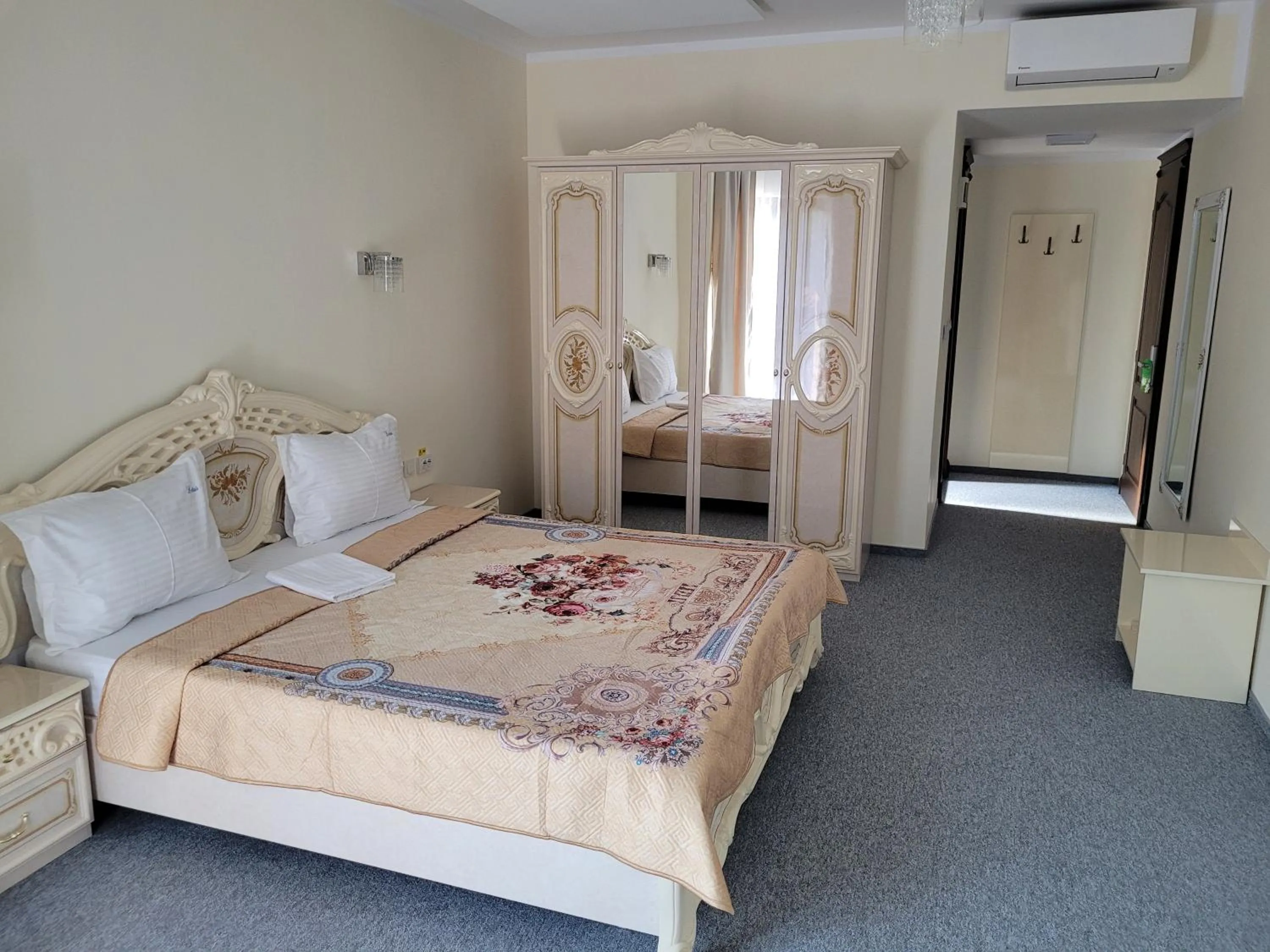 Photo of the whole room, Bed in LOTUS Boutique