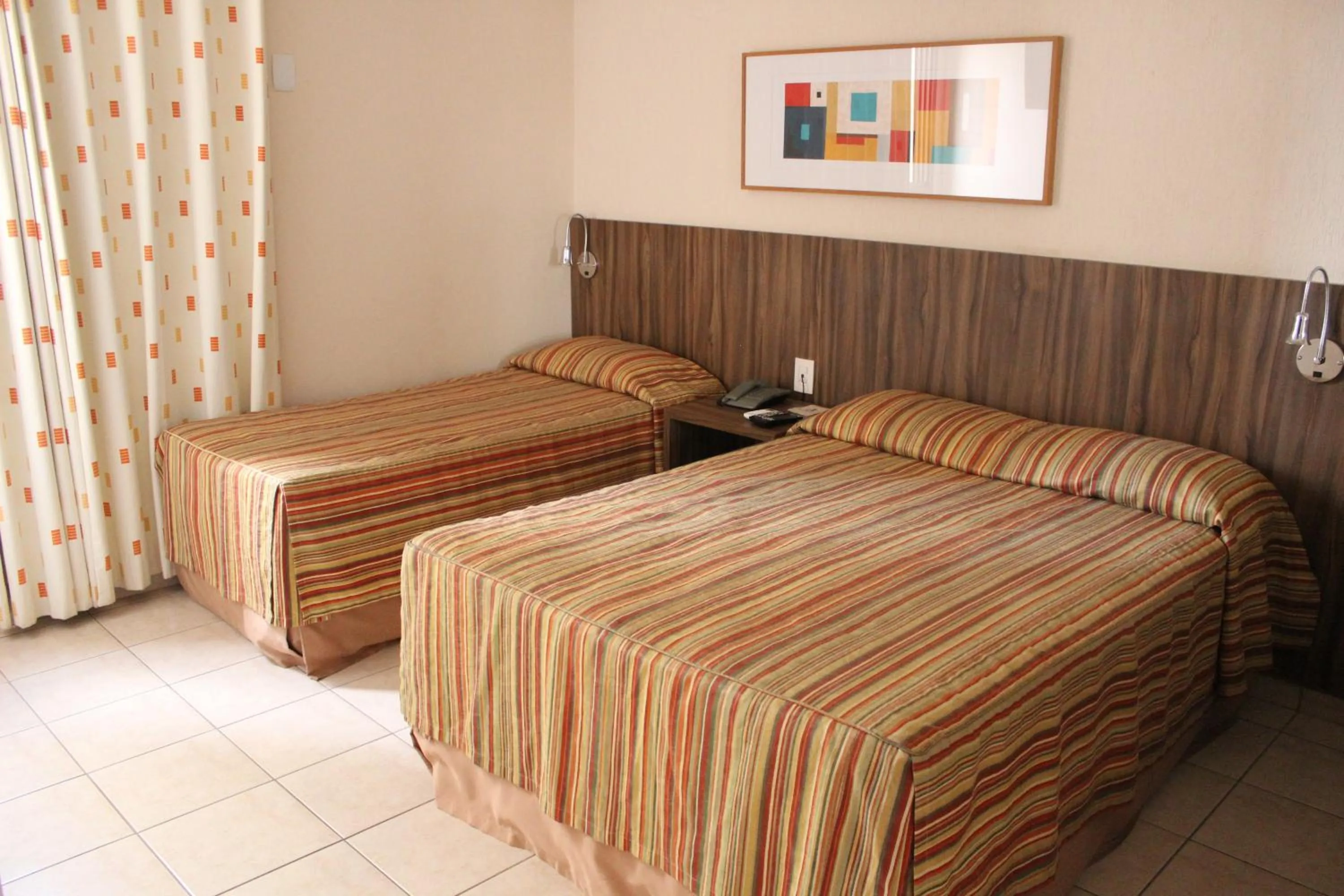 Bed in Hotel Riviera