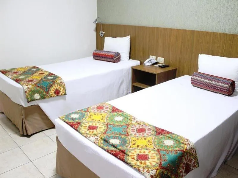 Bed in Hotel Riviera