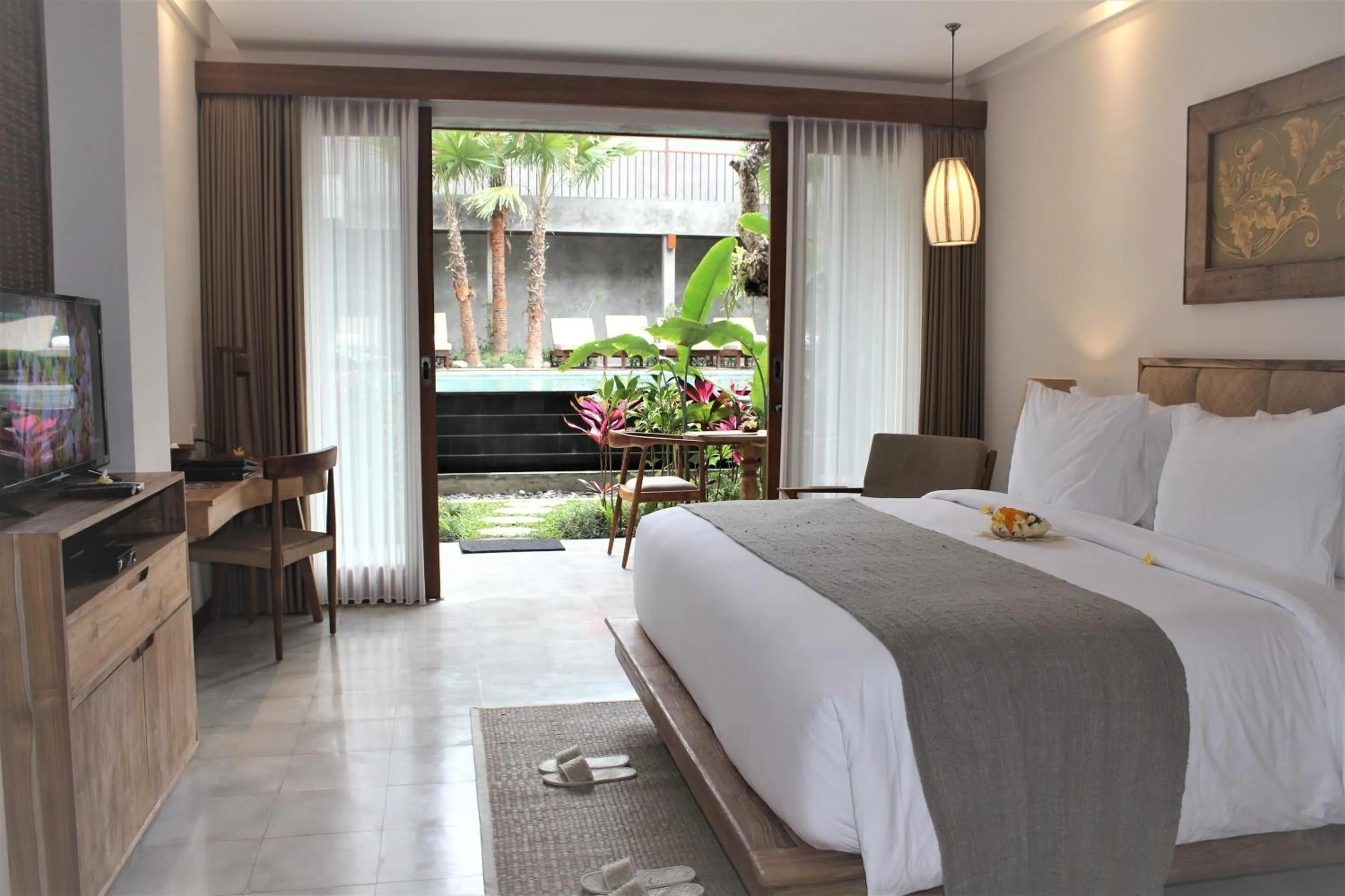 Photo of the whole room, Bed in Purana Suite Ubud
