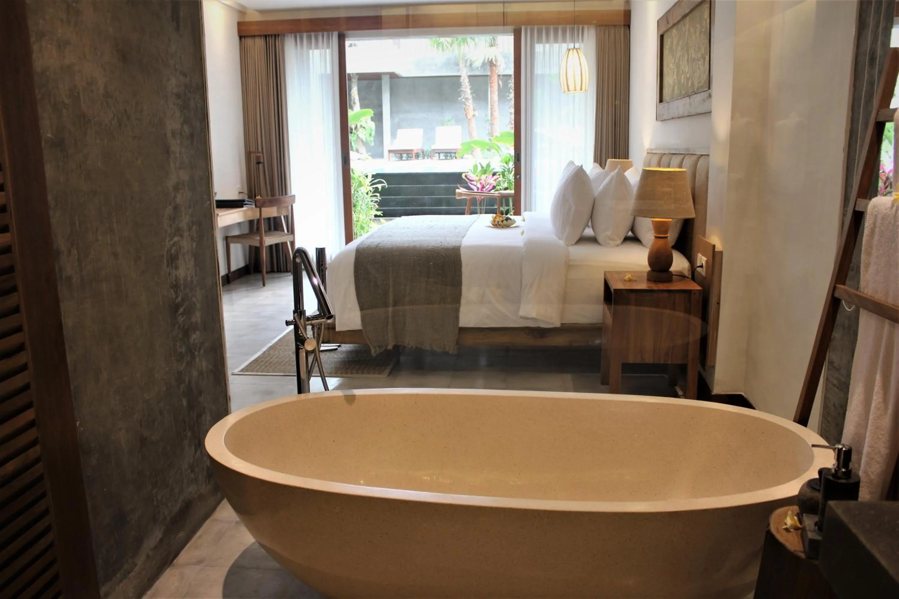 Bathroom, Bed in Purana Suite Ubud