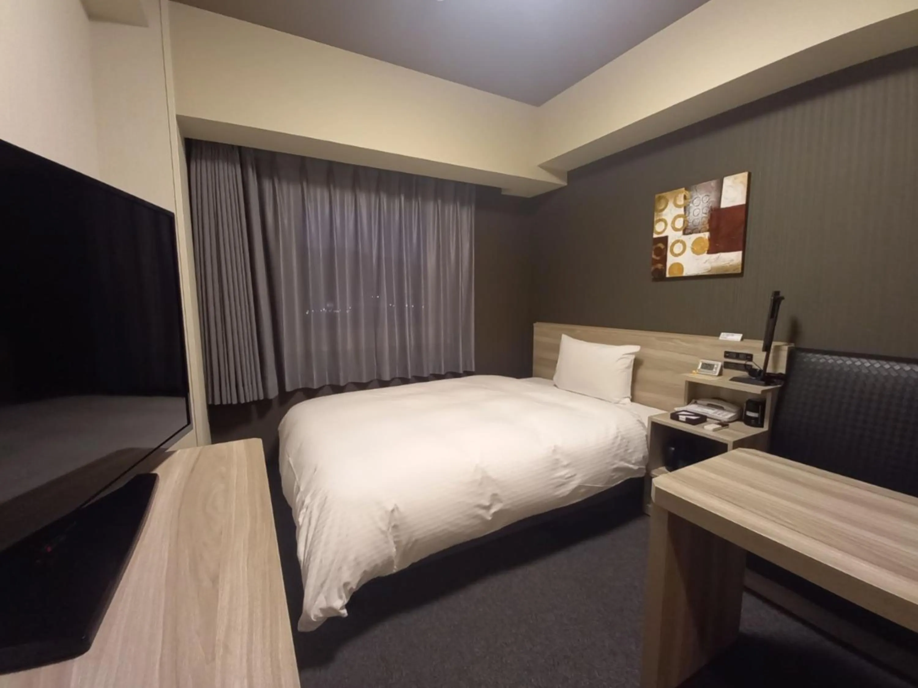 Photo of the whole room, Bed in Hotel Route-Inn Yamanashi Chuo