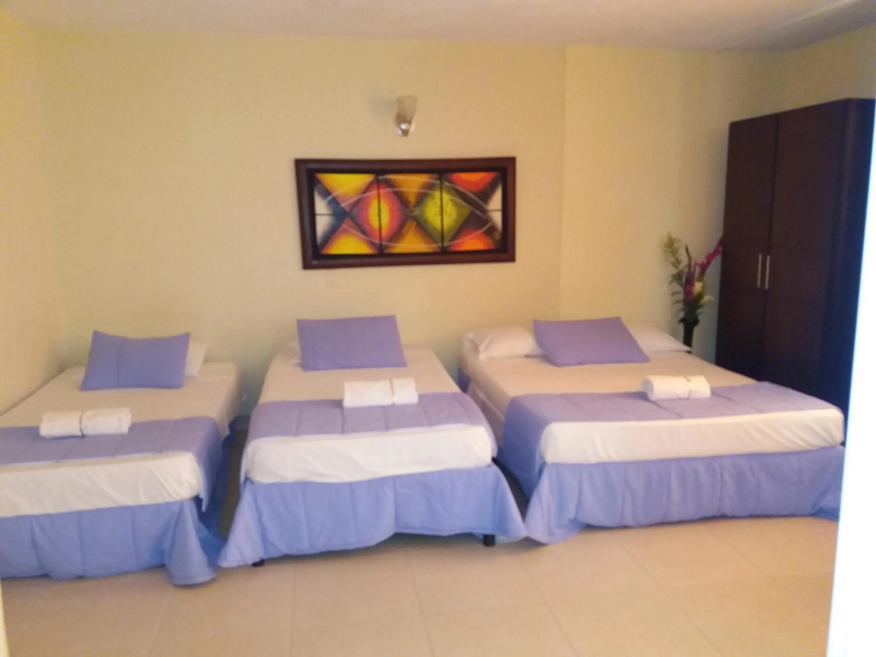 Bed in Hotel Tumburagua Soin Sas