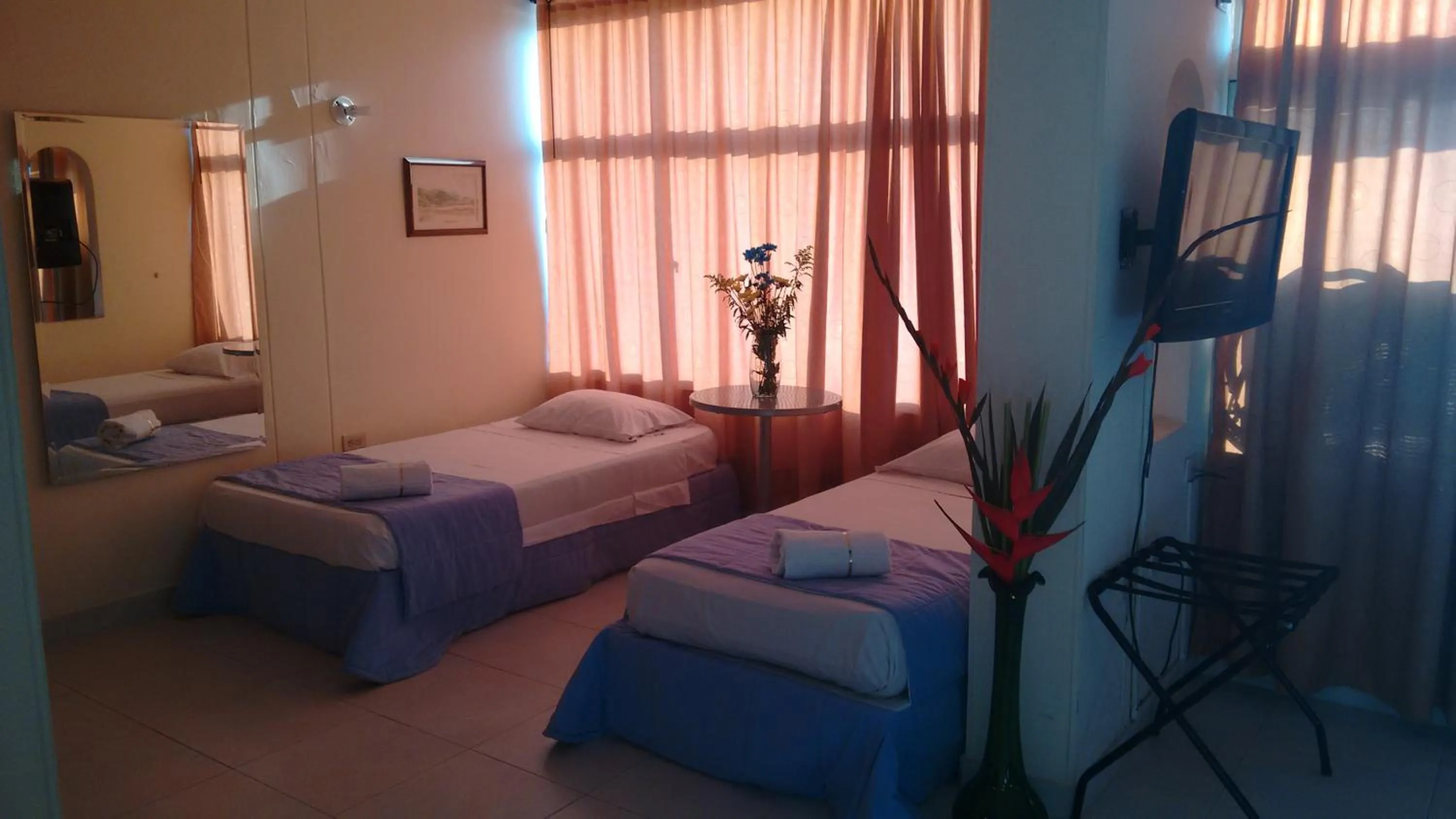 Bed in Hotel Tumburagua Soin Sas