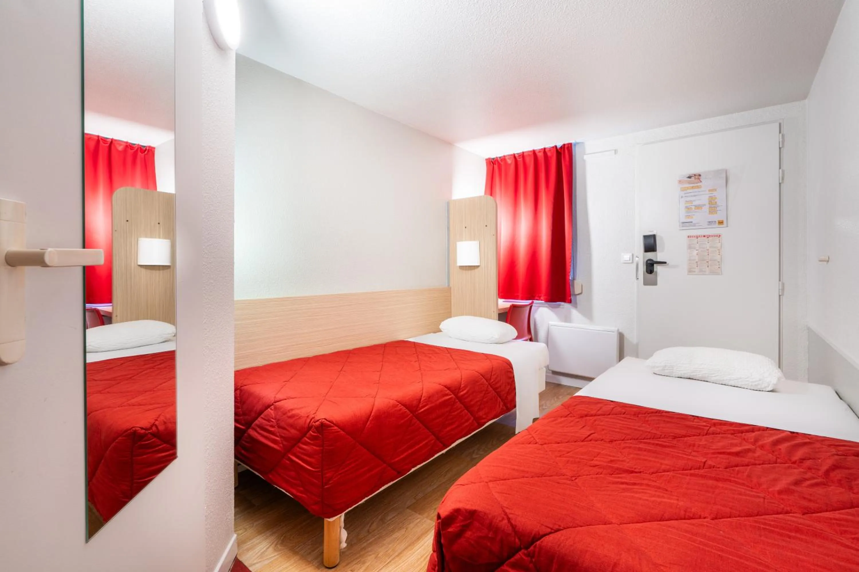 Photo of the whole room, Bed in Premiere Classe Deauville Touques