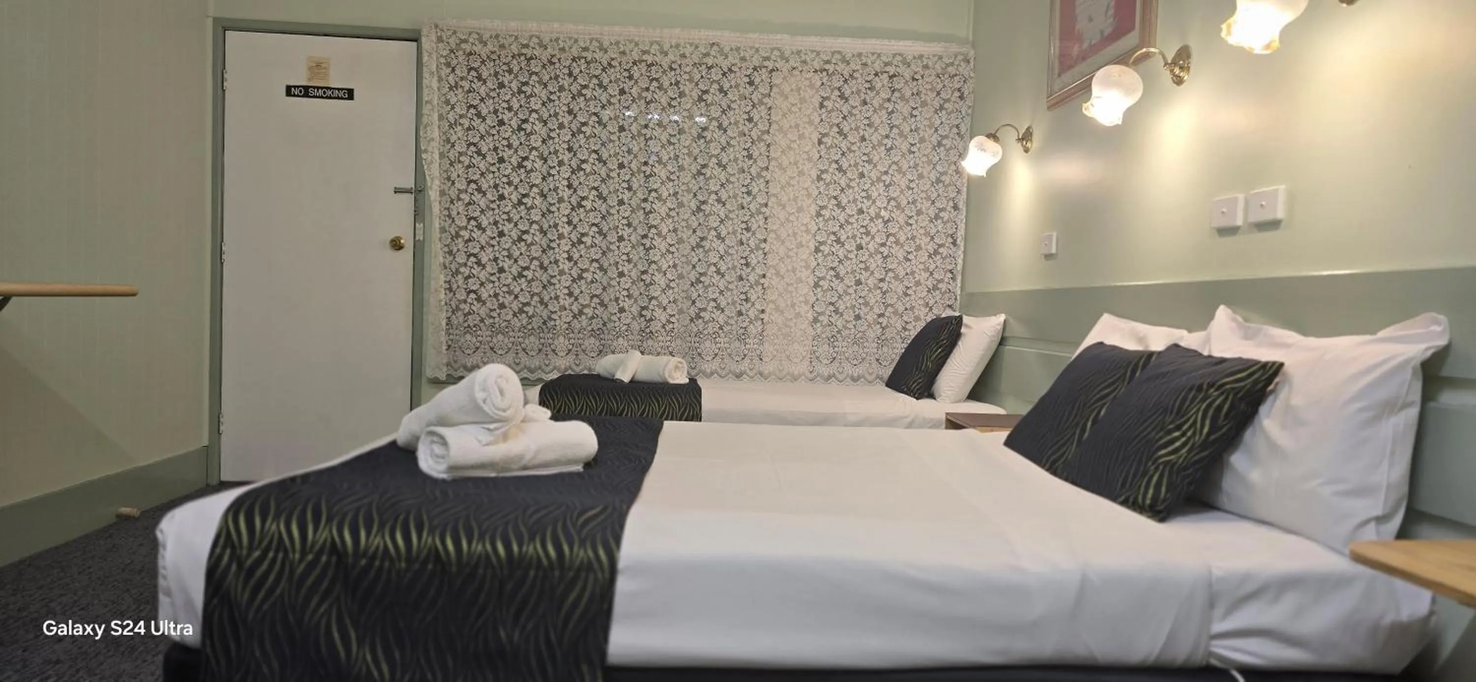 Bed in Lake Forbes Motel