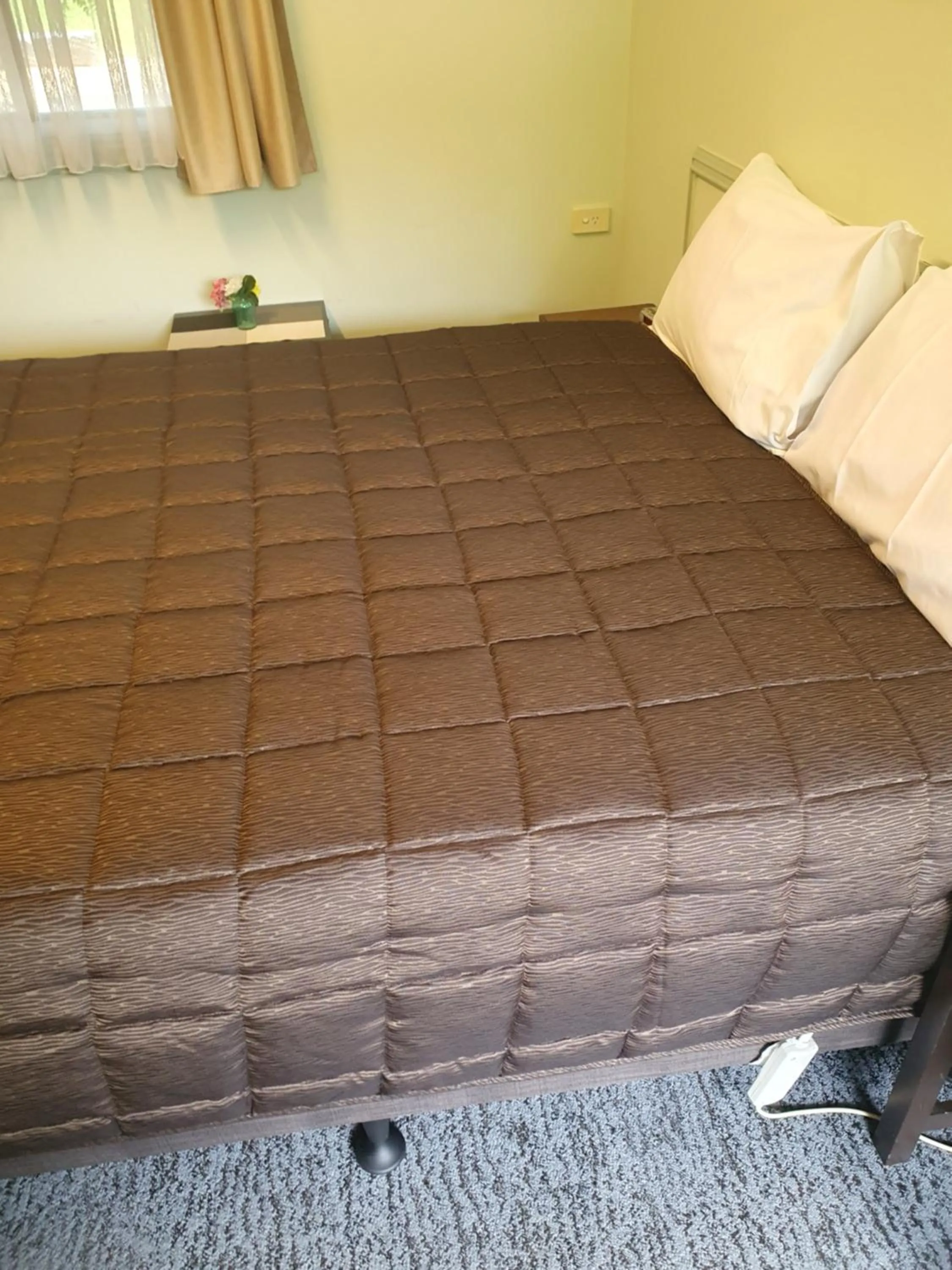 Bed in Lake Forbes Motel